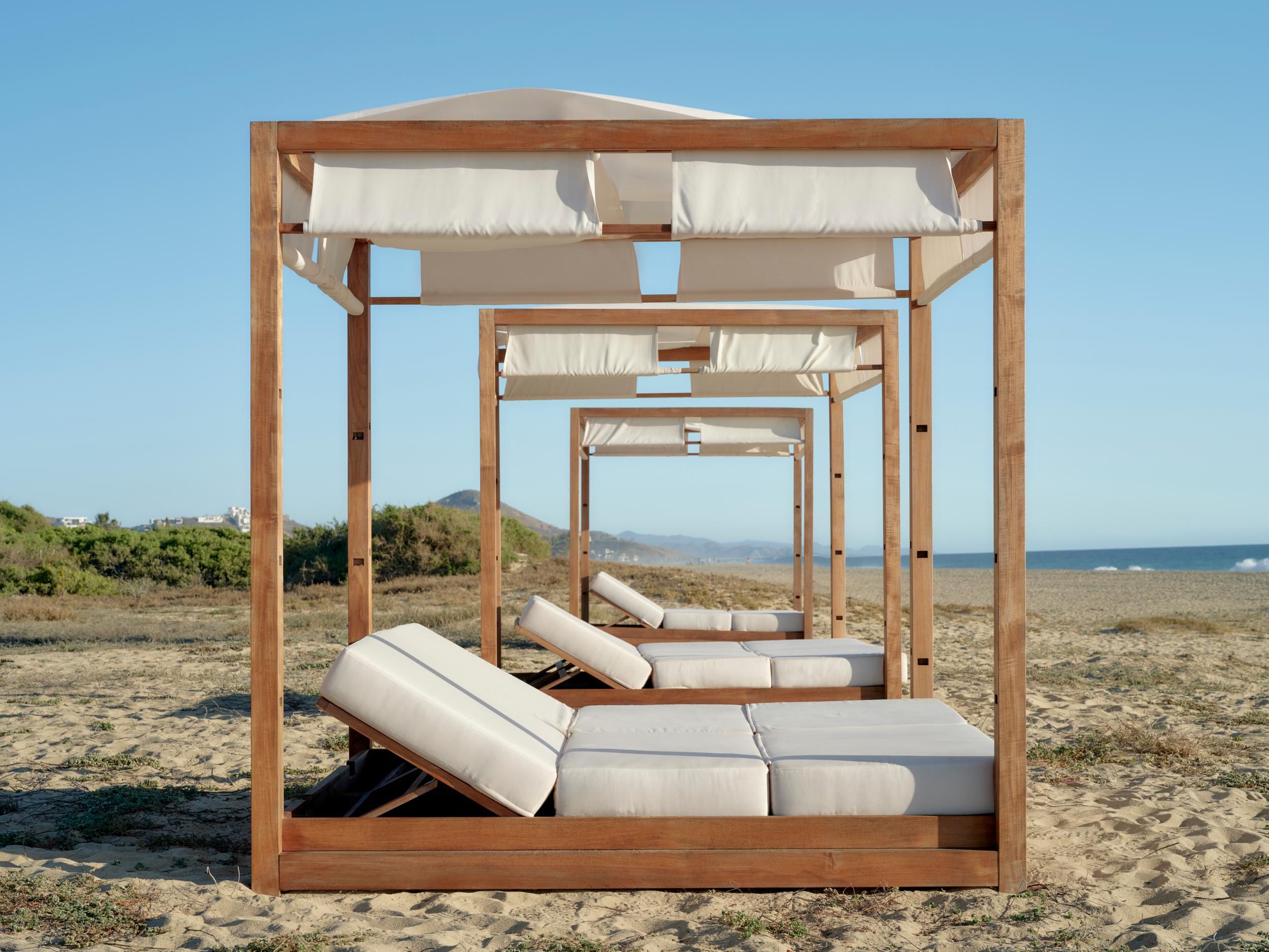 Beach cabanas available for guests, offering comfort and privacy.