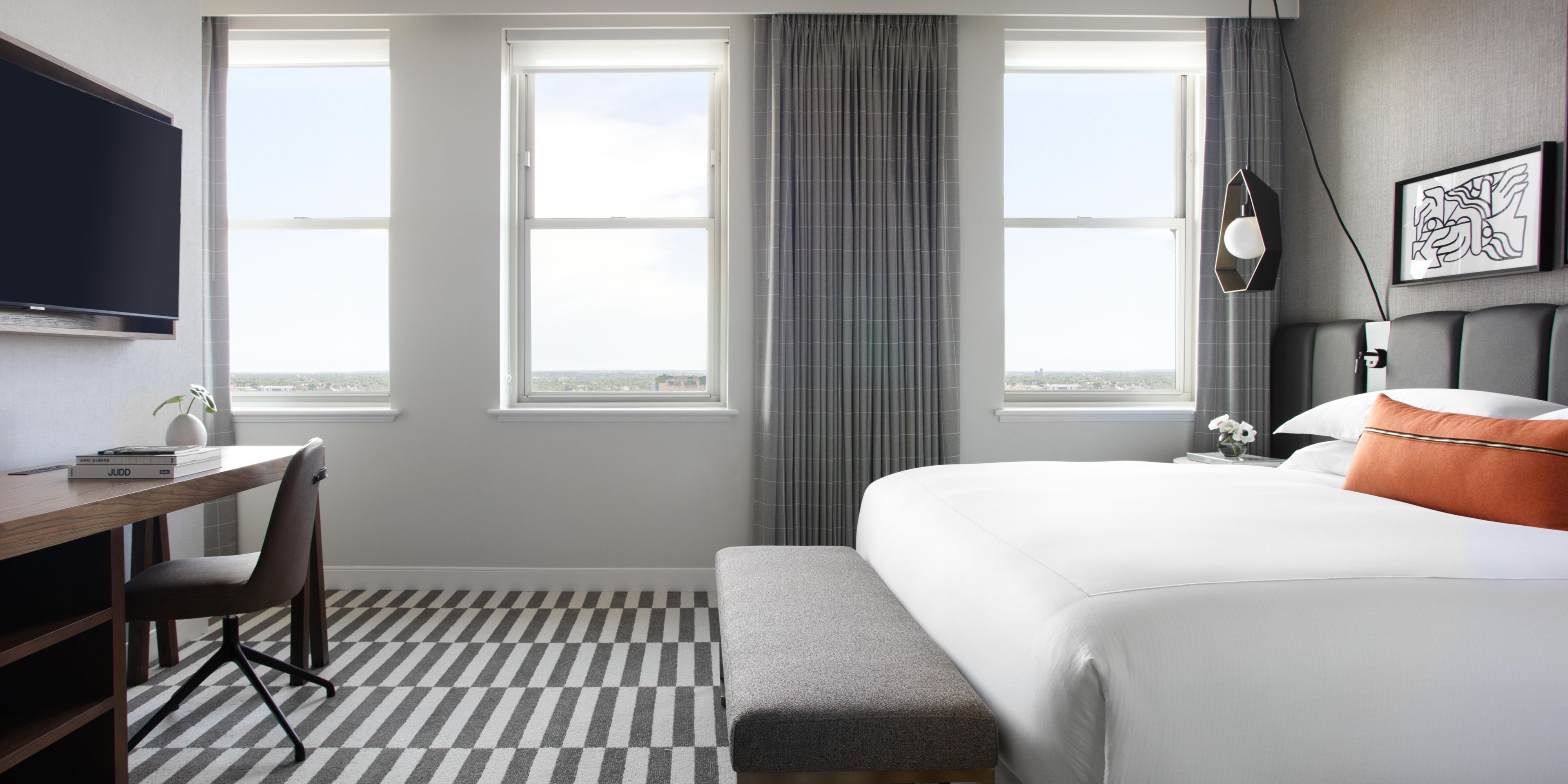 King guest room with views of downtown Fort Worth and Dallas.