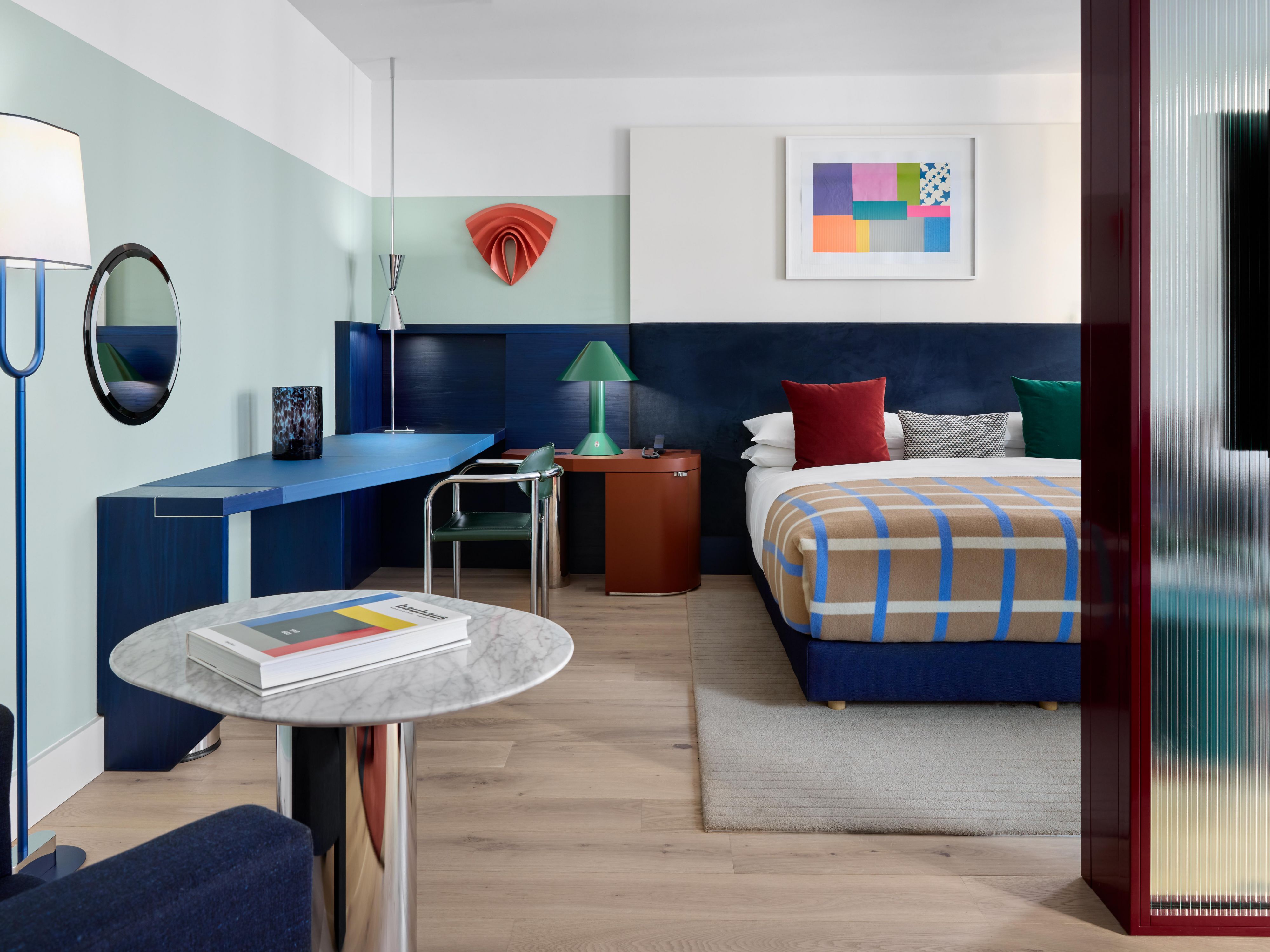 One bedroom hotel guest suite with king bed