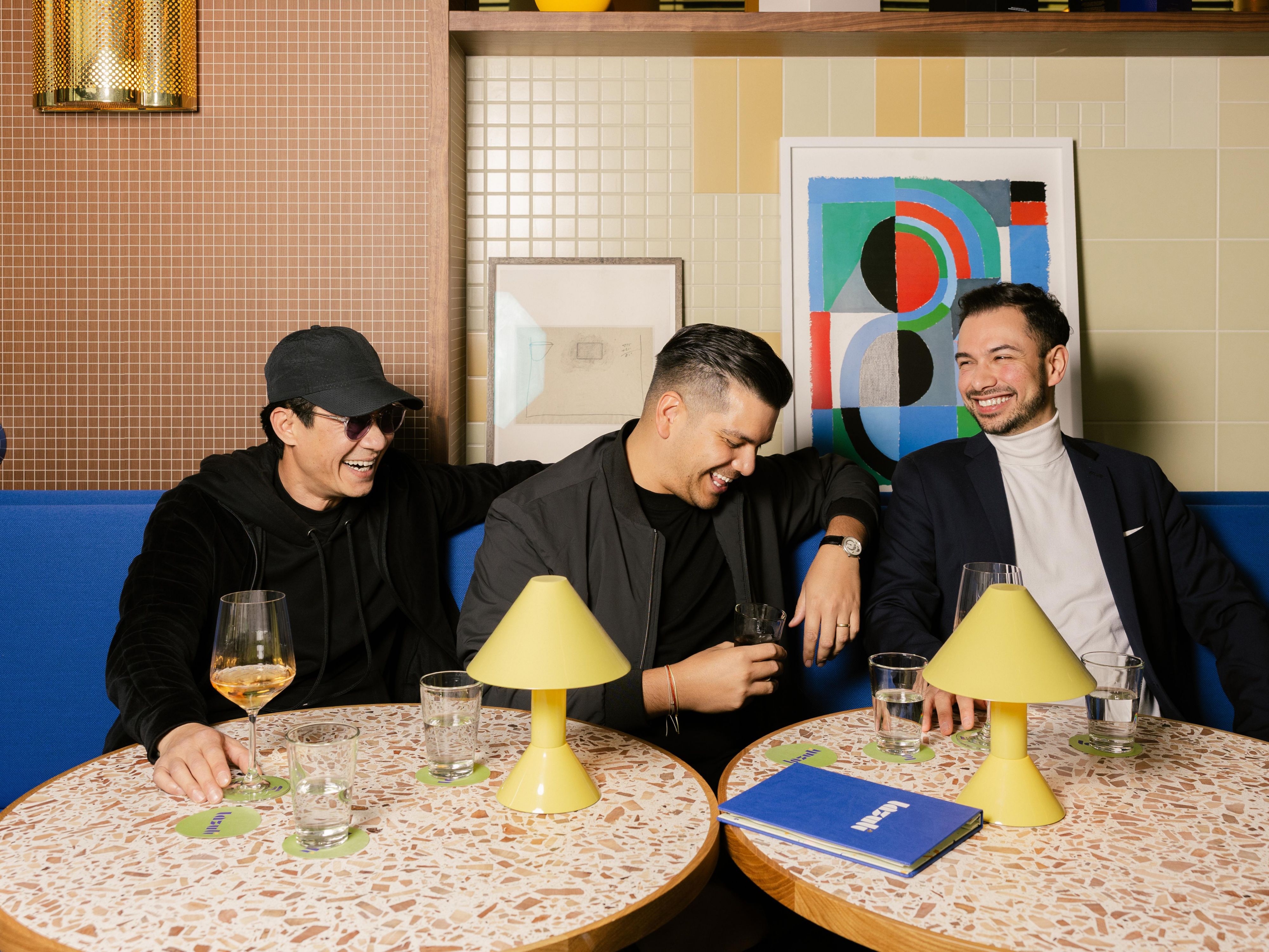 Group of men socialising with drinks