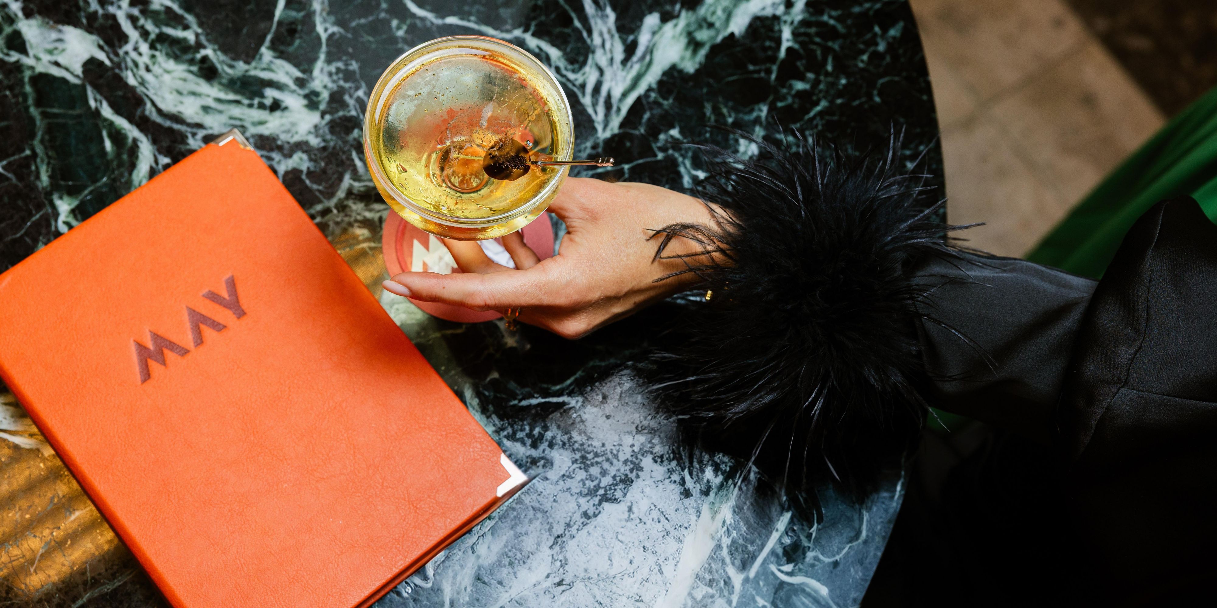 Cocktail and menu at May