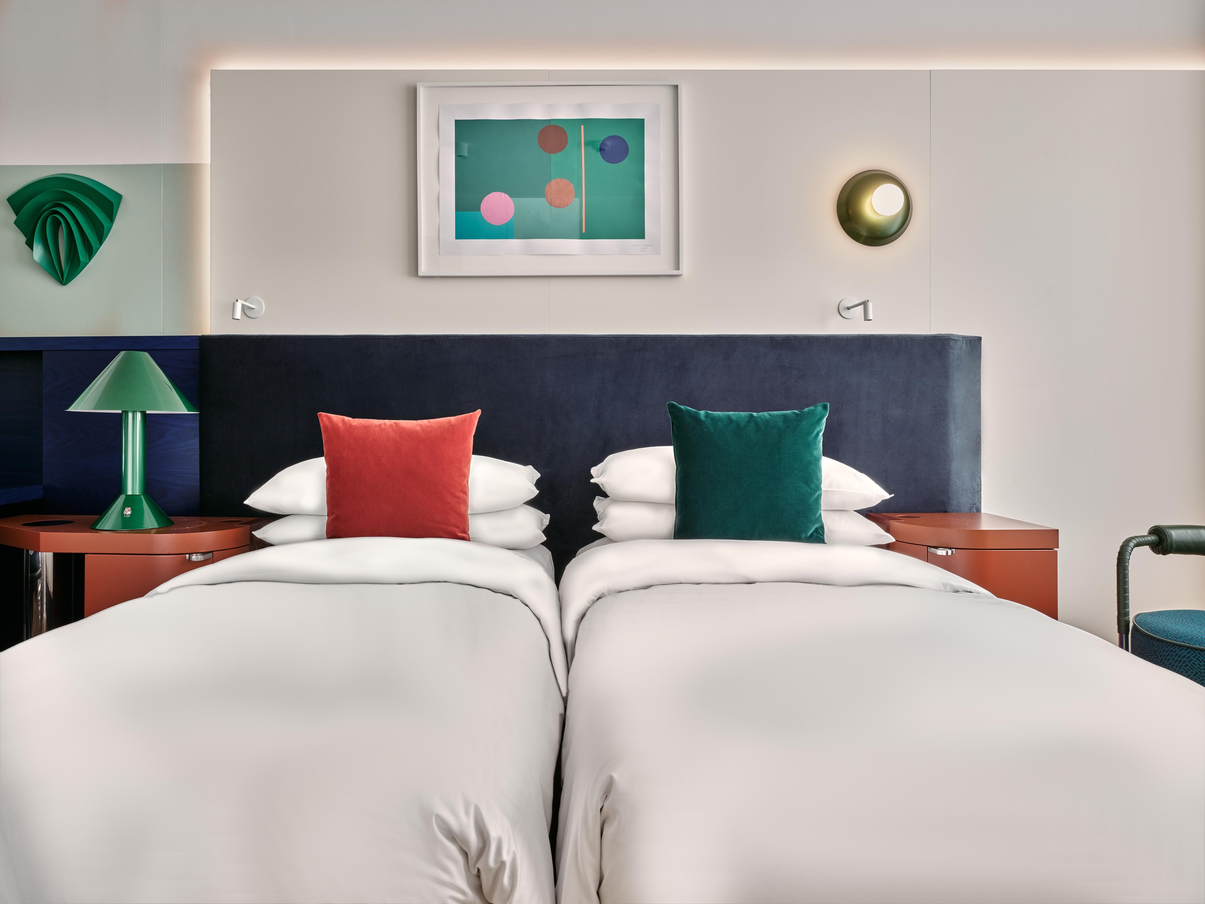 Enjoy a twin room with artistic design and thoughtful amenities.