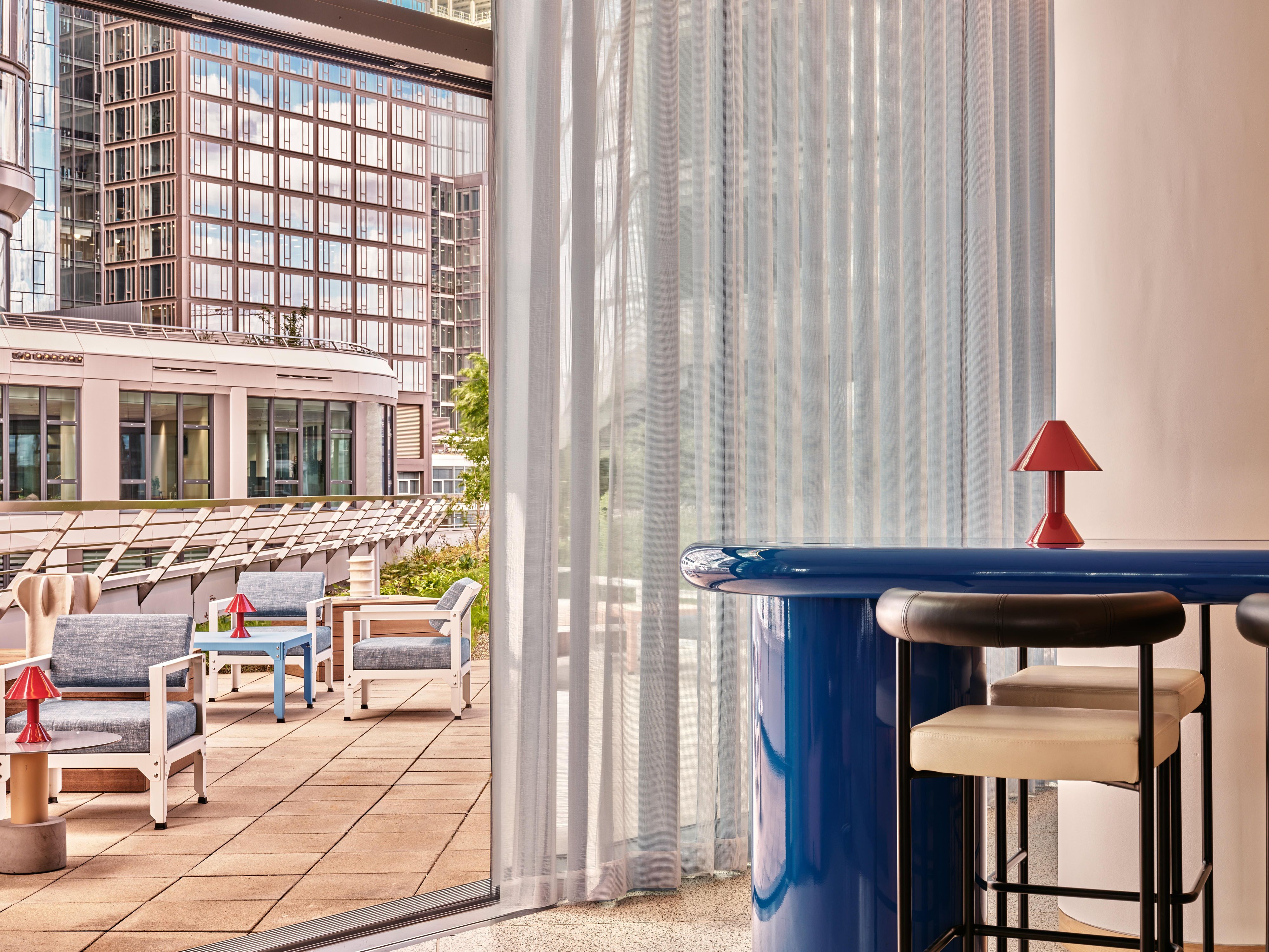 Relax on the stylish terrace of the Mainhattan room.