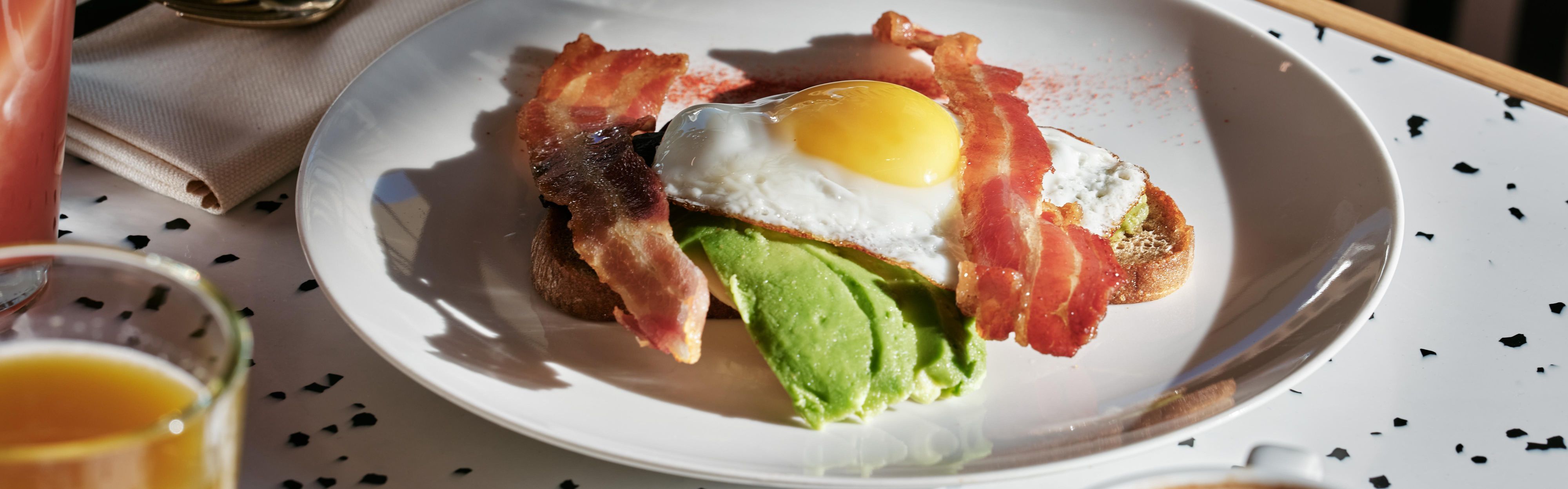 fried egg on toast with avocado