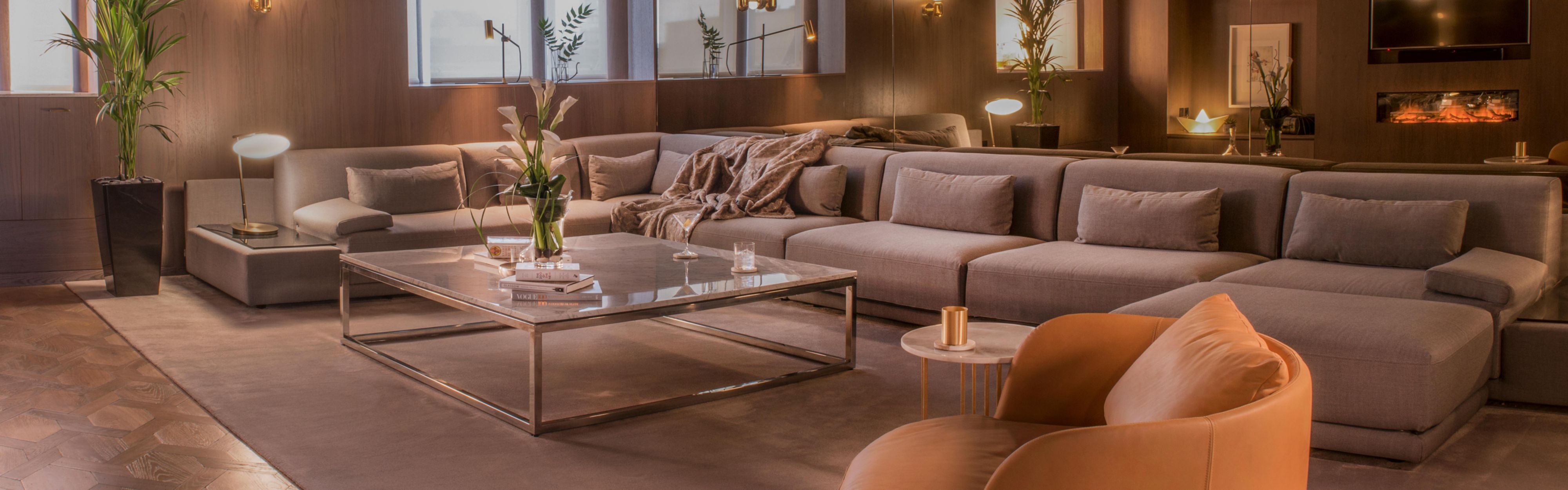Penthouse living room with a long couch