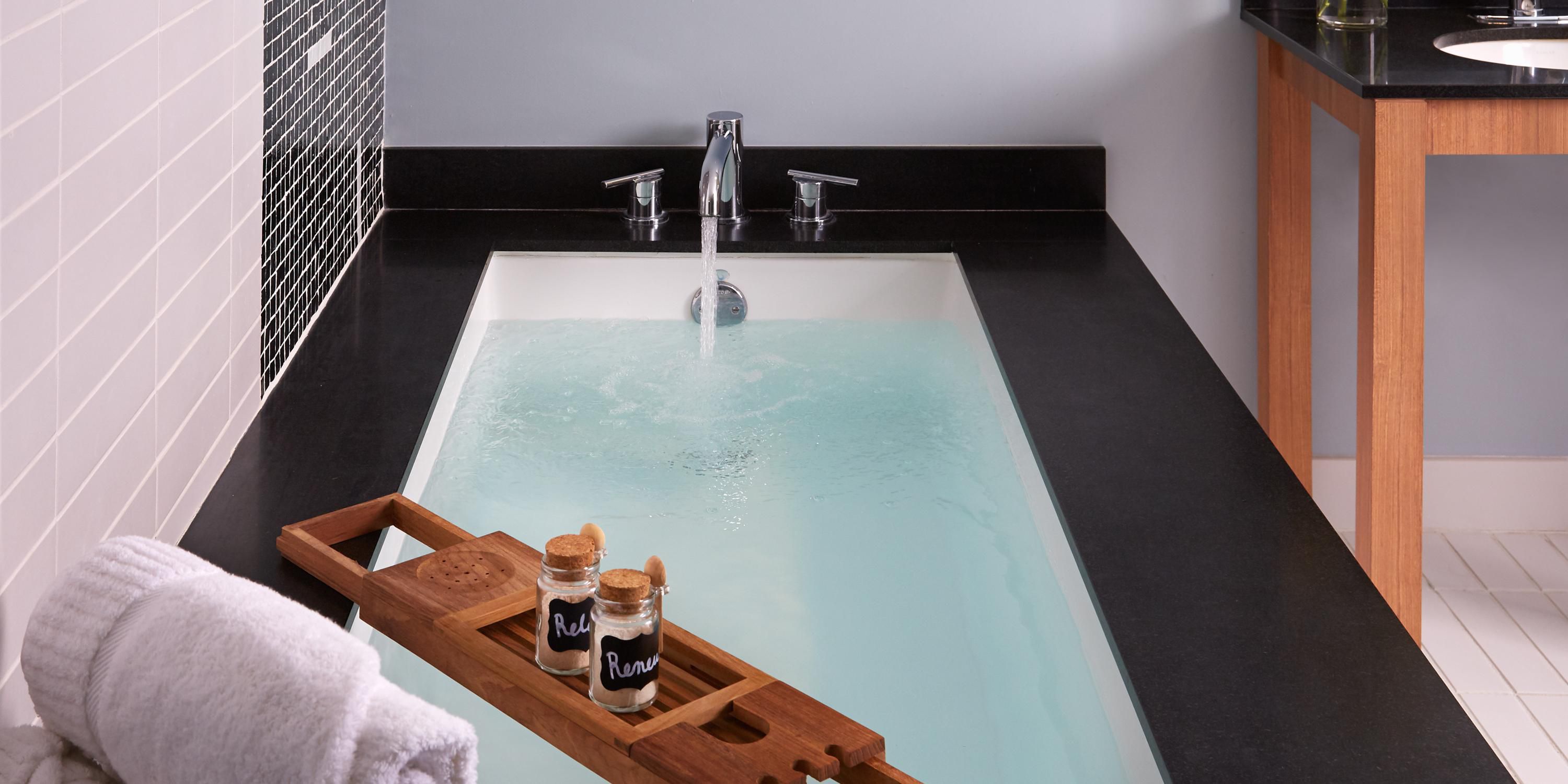 Soaker tub with luxury bath amenities 