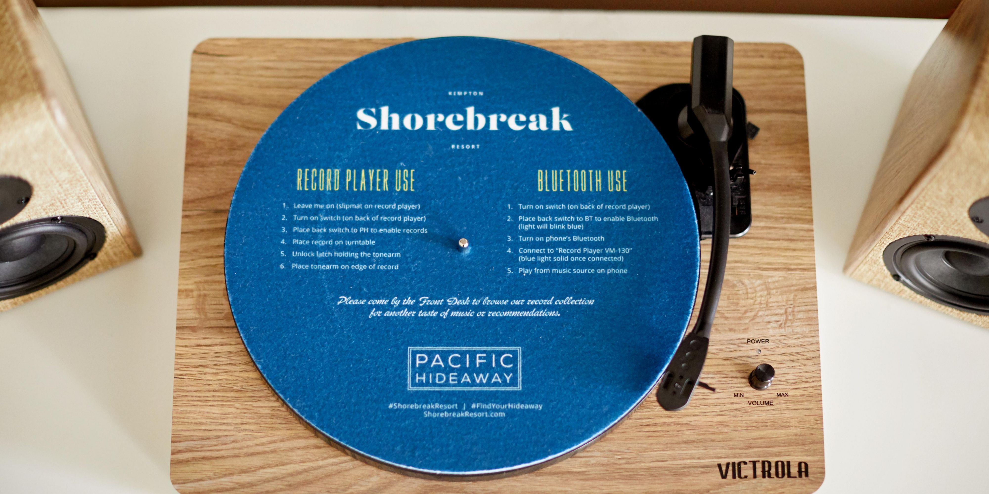 In-room record players with Bluetooth capability