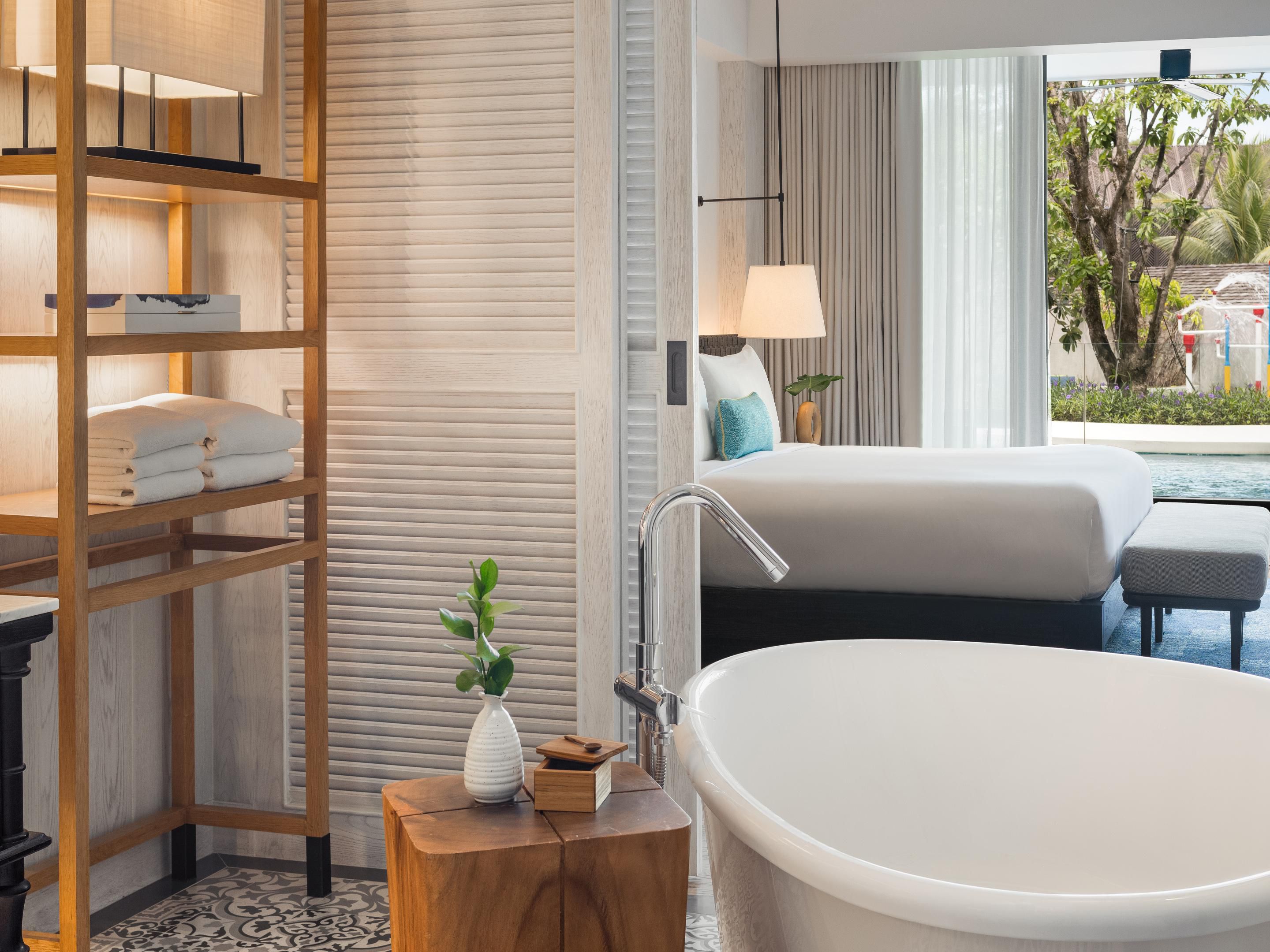 Essential King Bedroom with Pool Access and Resort View Bathroom