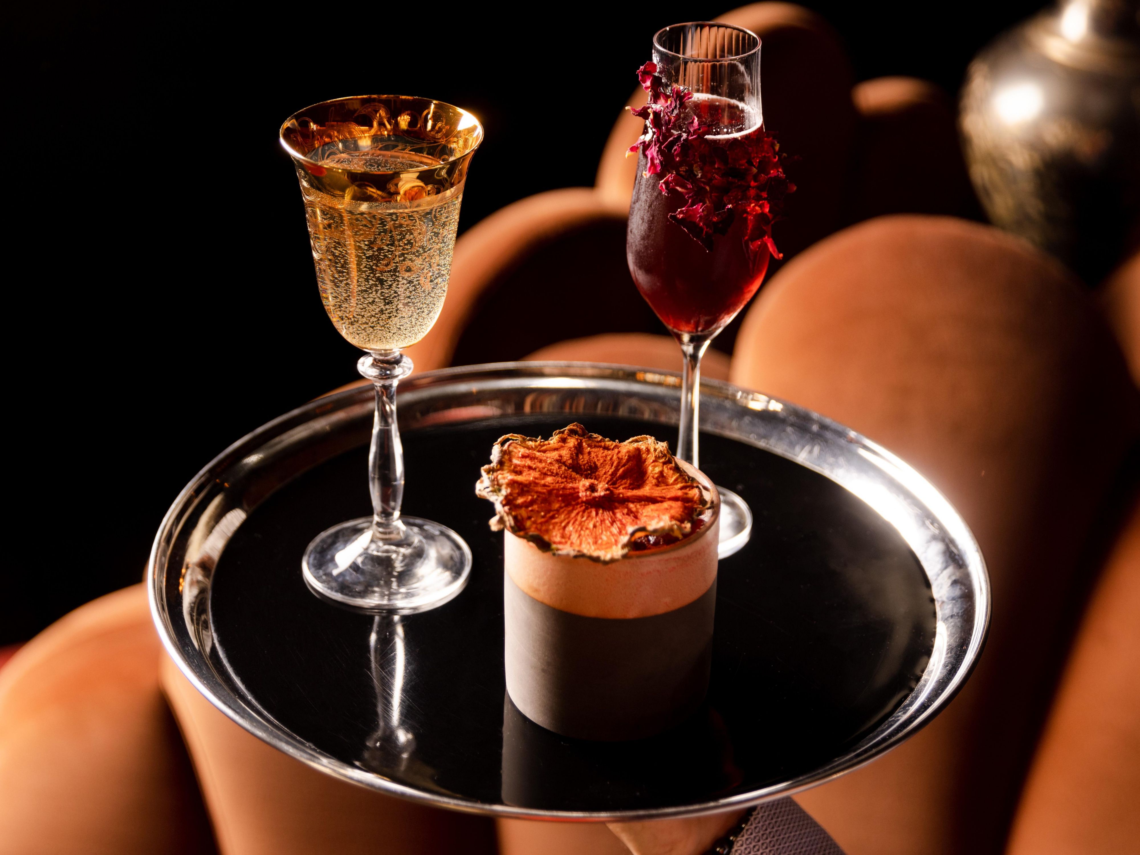 Pour over our exquisite cocktail menu, inspired by our iconic past