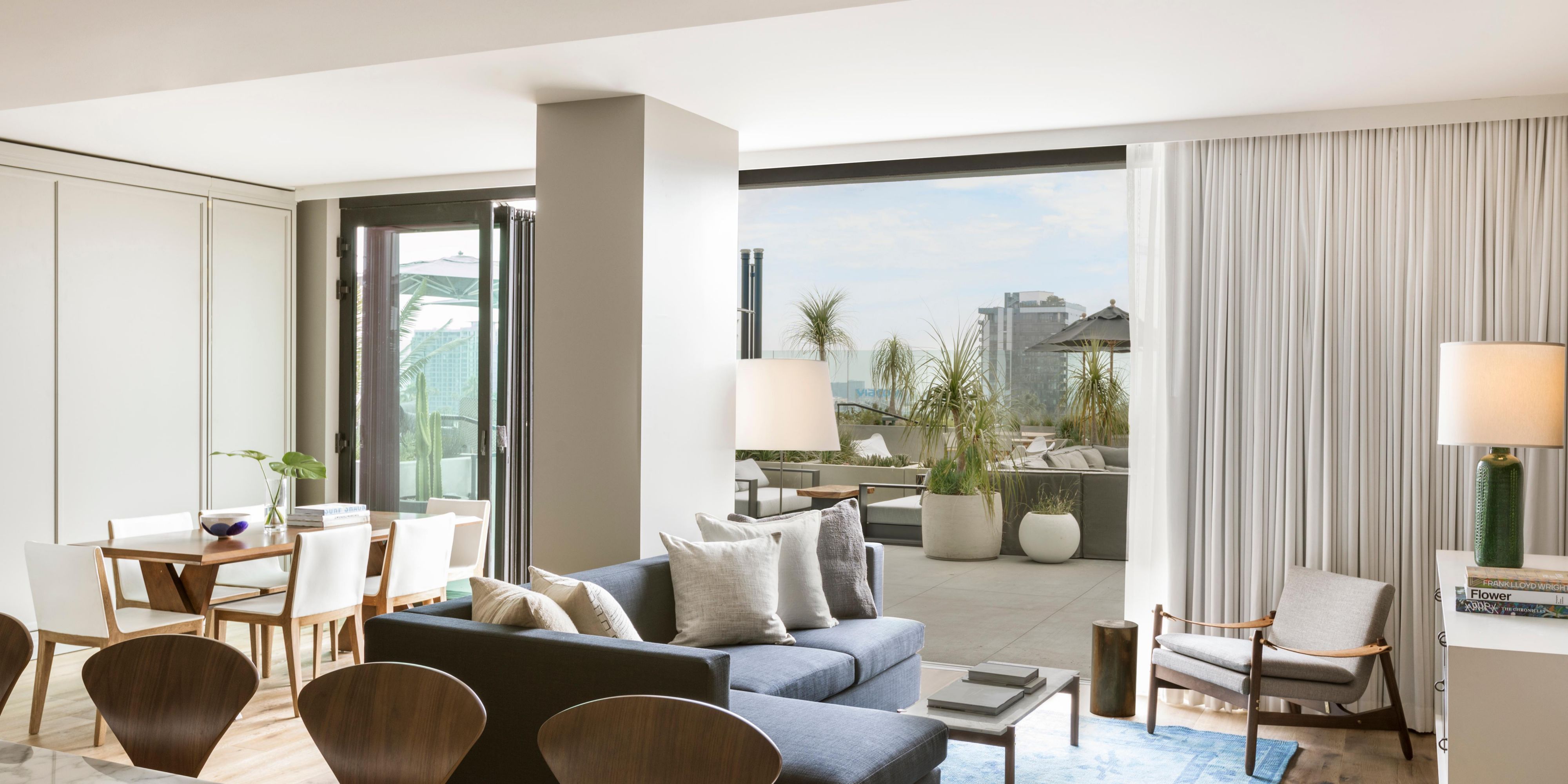 Living and dining areas plus a queen size built-in murphy bed
