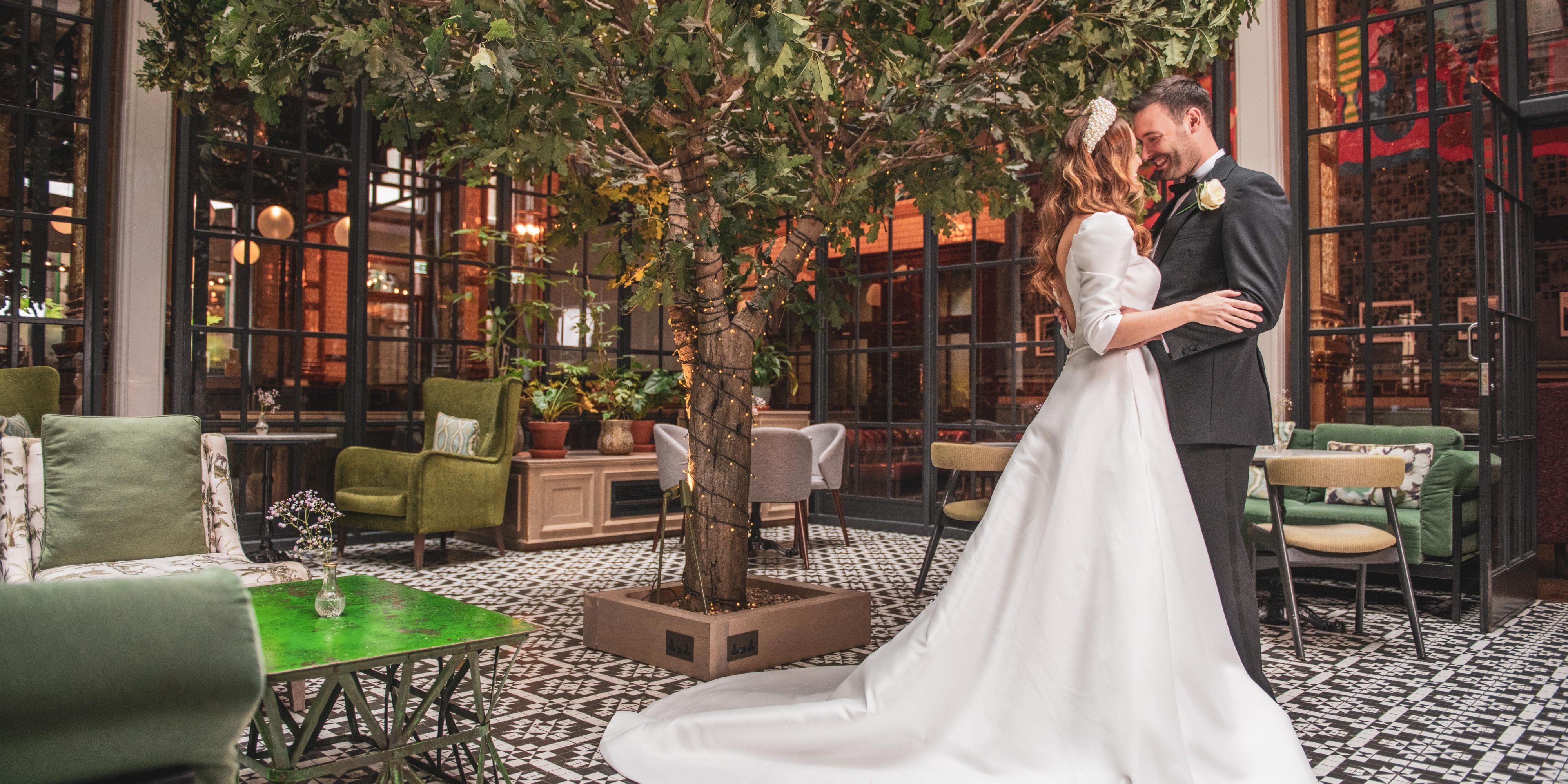 Say “I Do” at Kimpton Clocktower Hotel, a truly unique venue combining Victorian grandeur with quirky details. Oak paneling, dramatic chandeliers, and high ceilings set the tone for an unforgettable special day, whether you're hosting an elaborate gathering with hundreds of friends or an intimate dinner with your nearest and dearest. 