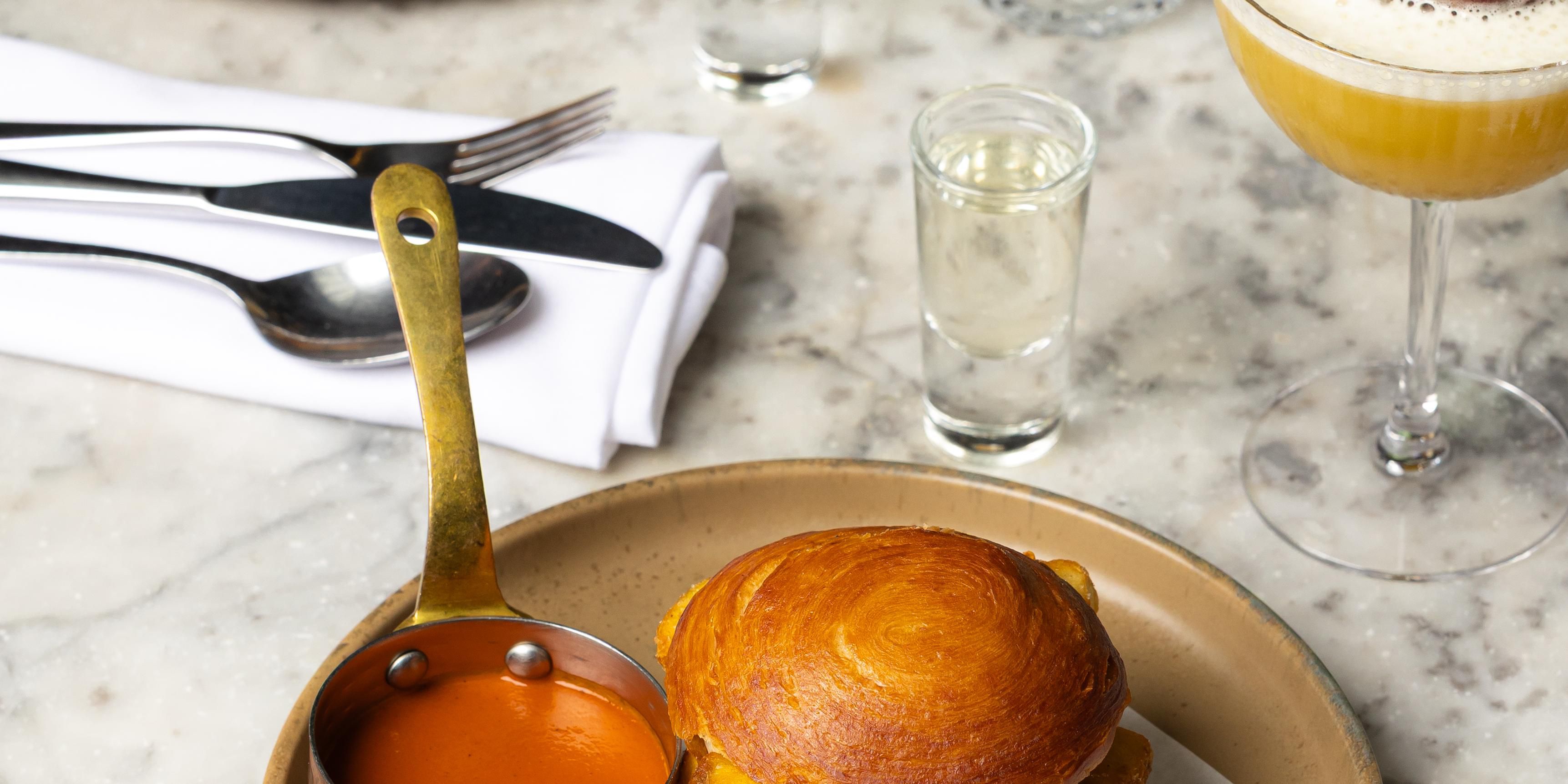 Gather the group and turn those “we really need to catch up” messages into an actual plan. Every Tuesday from 4:30–7:30pm, Refuge plays host to Girl Dinner - a midweek ritual built around a Refuge-style chip butty, a perfectly poured Pornstar Martini, and unhurried conversation. No agendas, no rushing. Just comfort food, cocktails and good company.