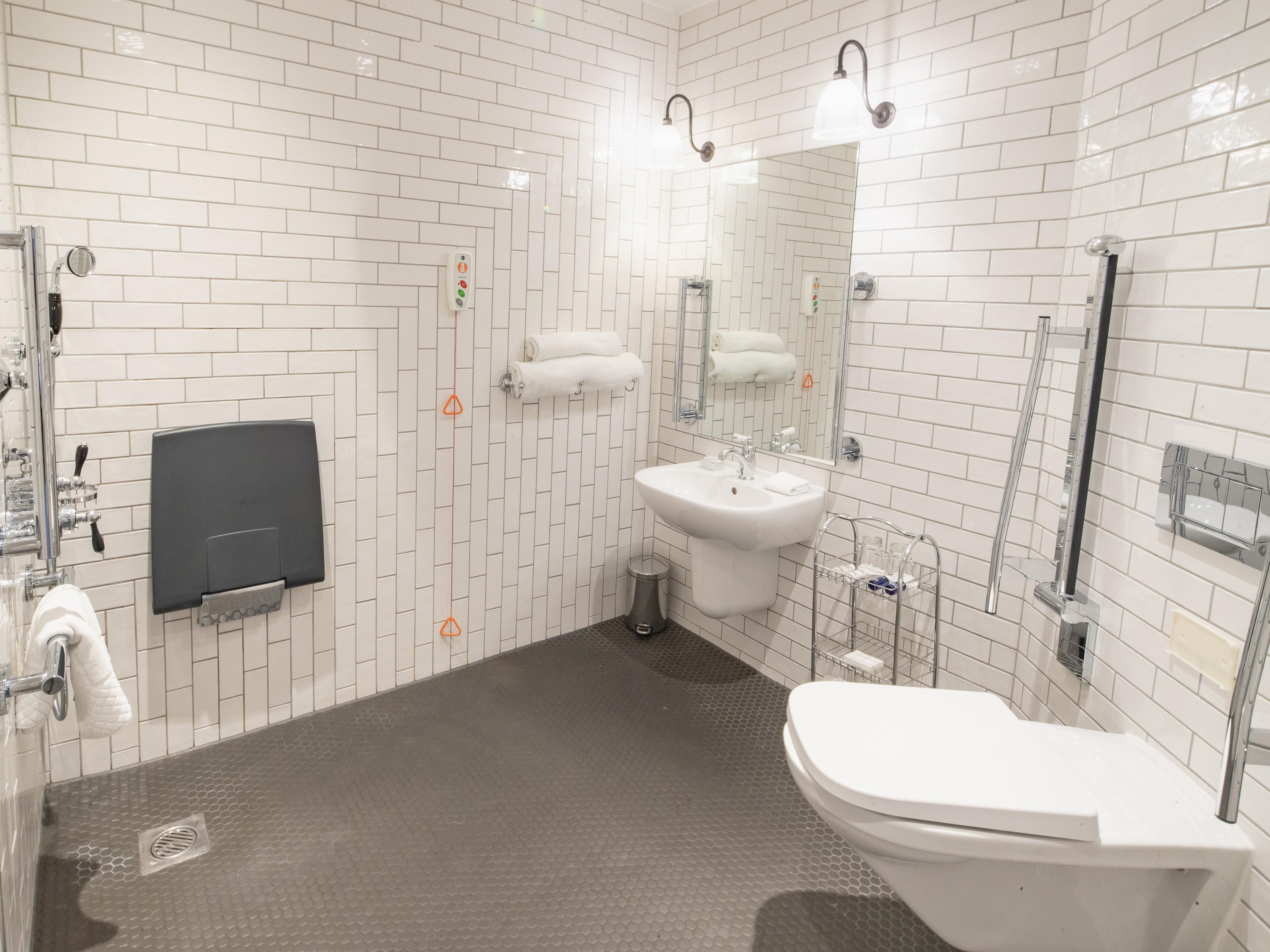 Accessible bathroom with roll in shower