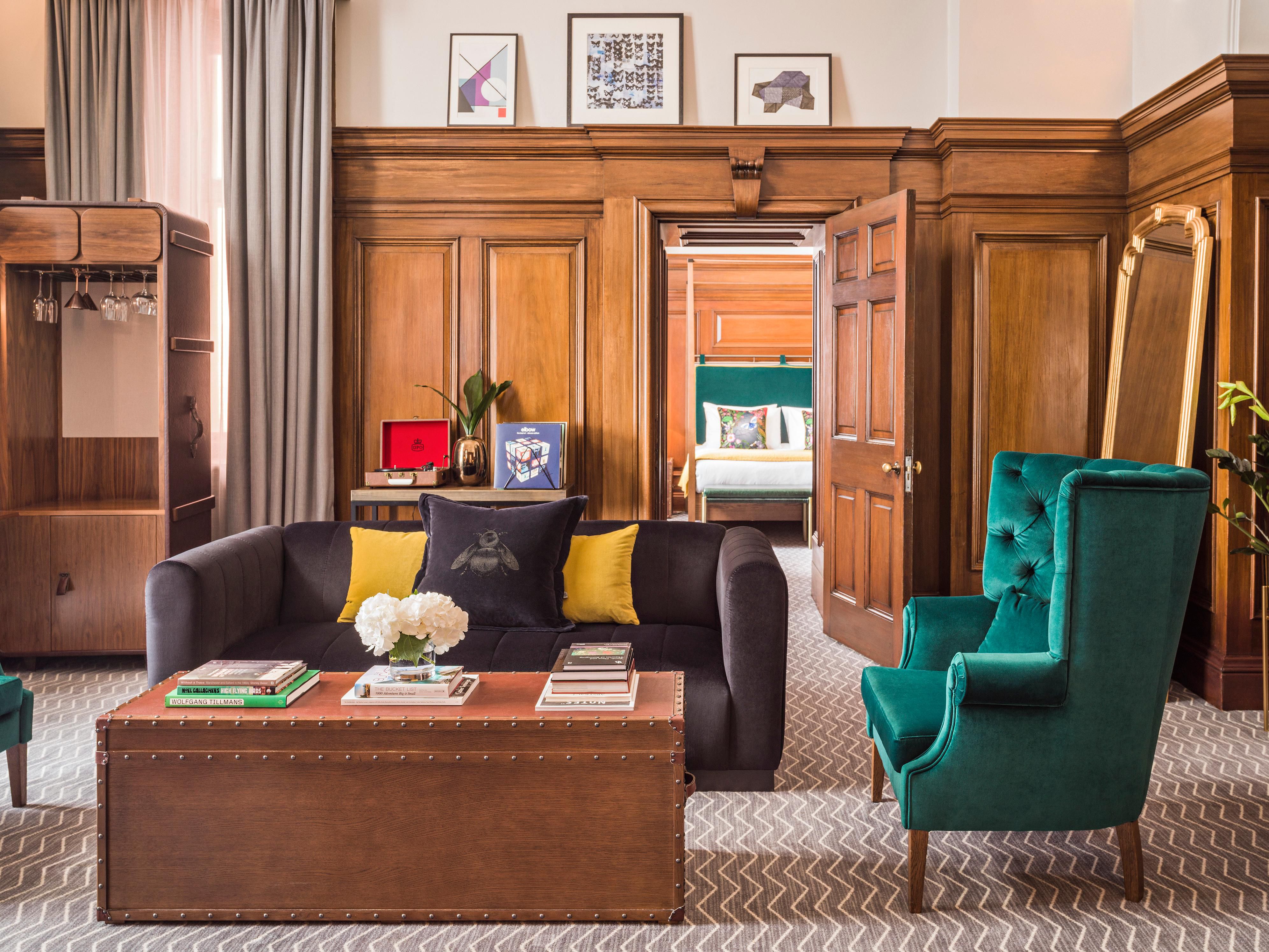 Heritage Suite Spacious separate lounge with wood panelling 