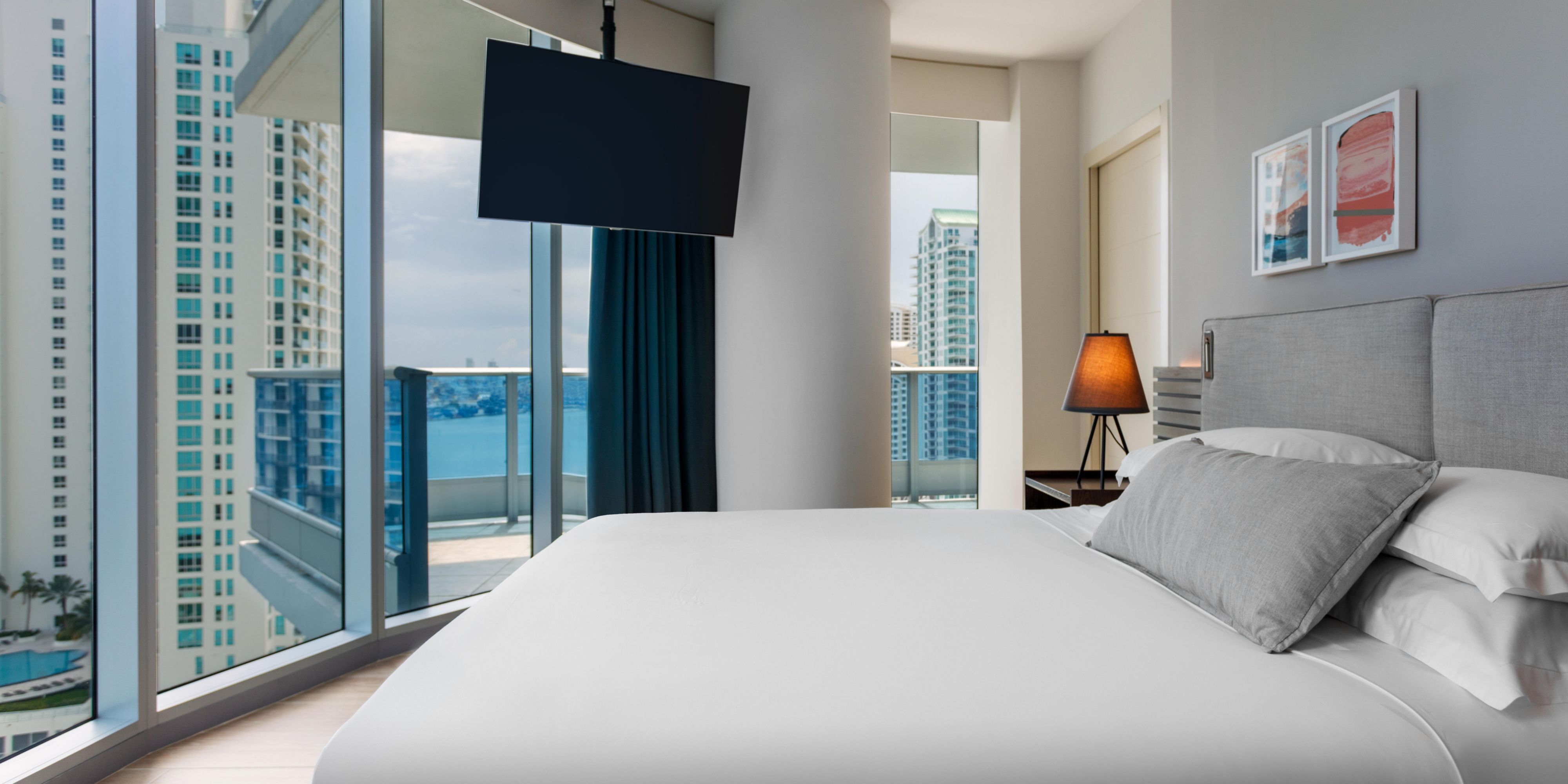 Suite Bedroom with King Bed and Water Views 