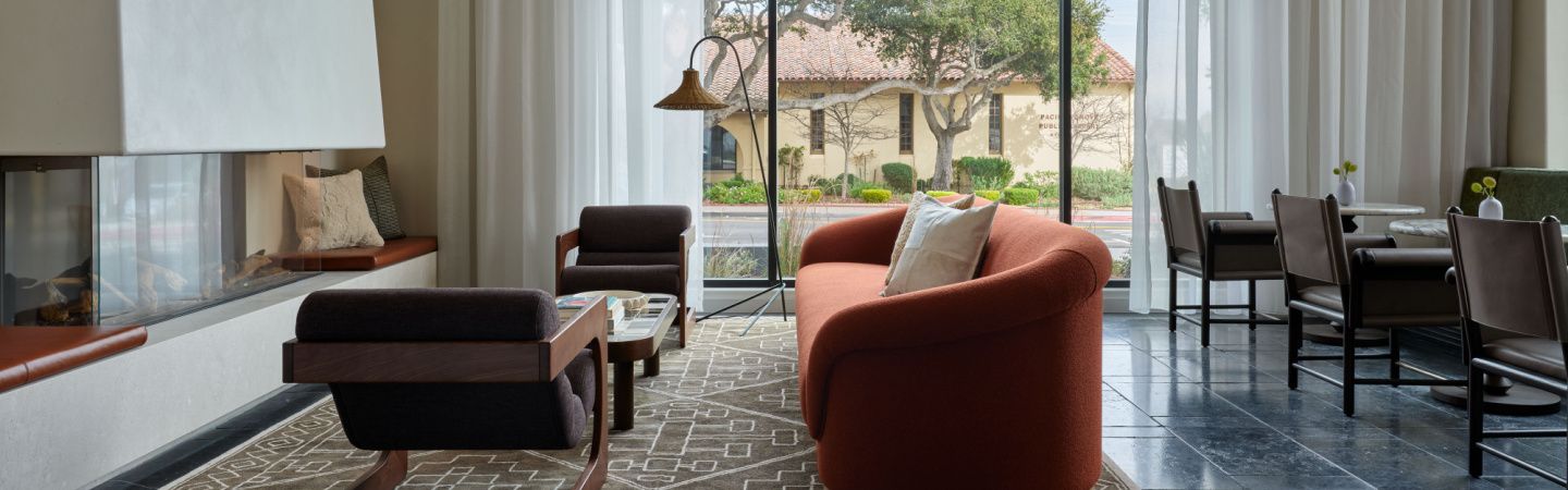 Lobby living room with fireplace at Kimpton Mirador Pacific Grove