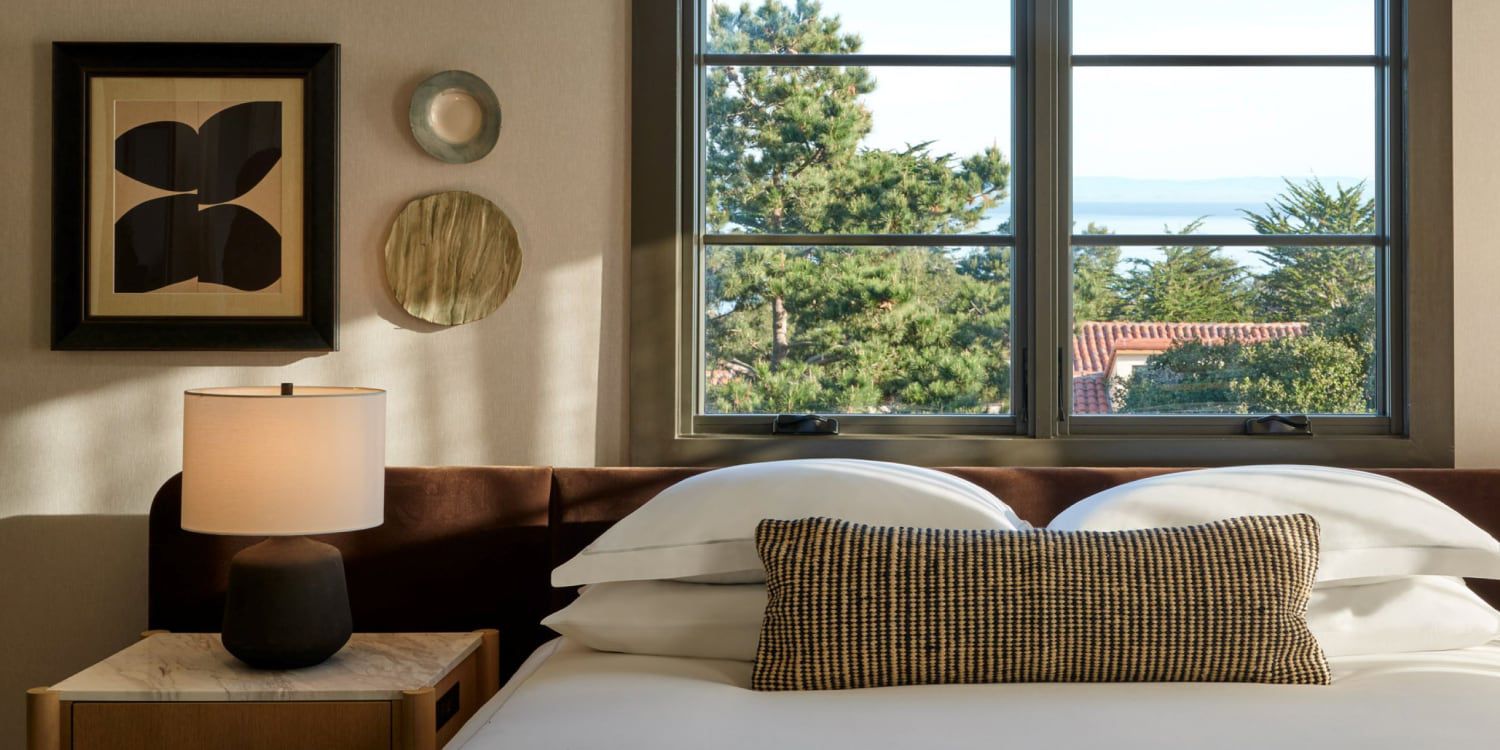 Cozy guest room overlooking the coast at Kimpton Mirador