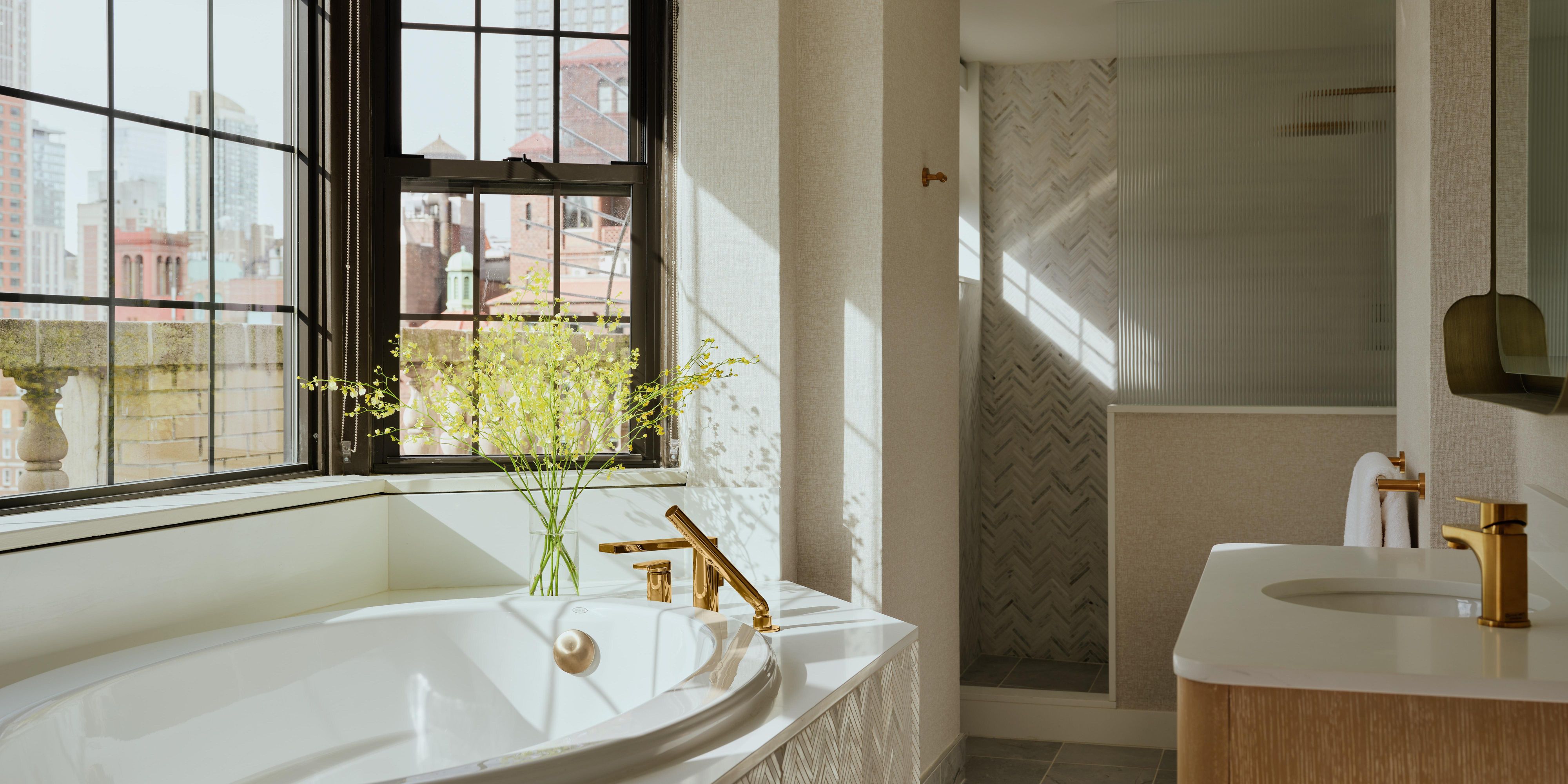 Luxury suite featuring a spacious, thoughtfully designed bathroom