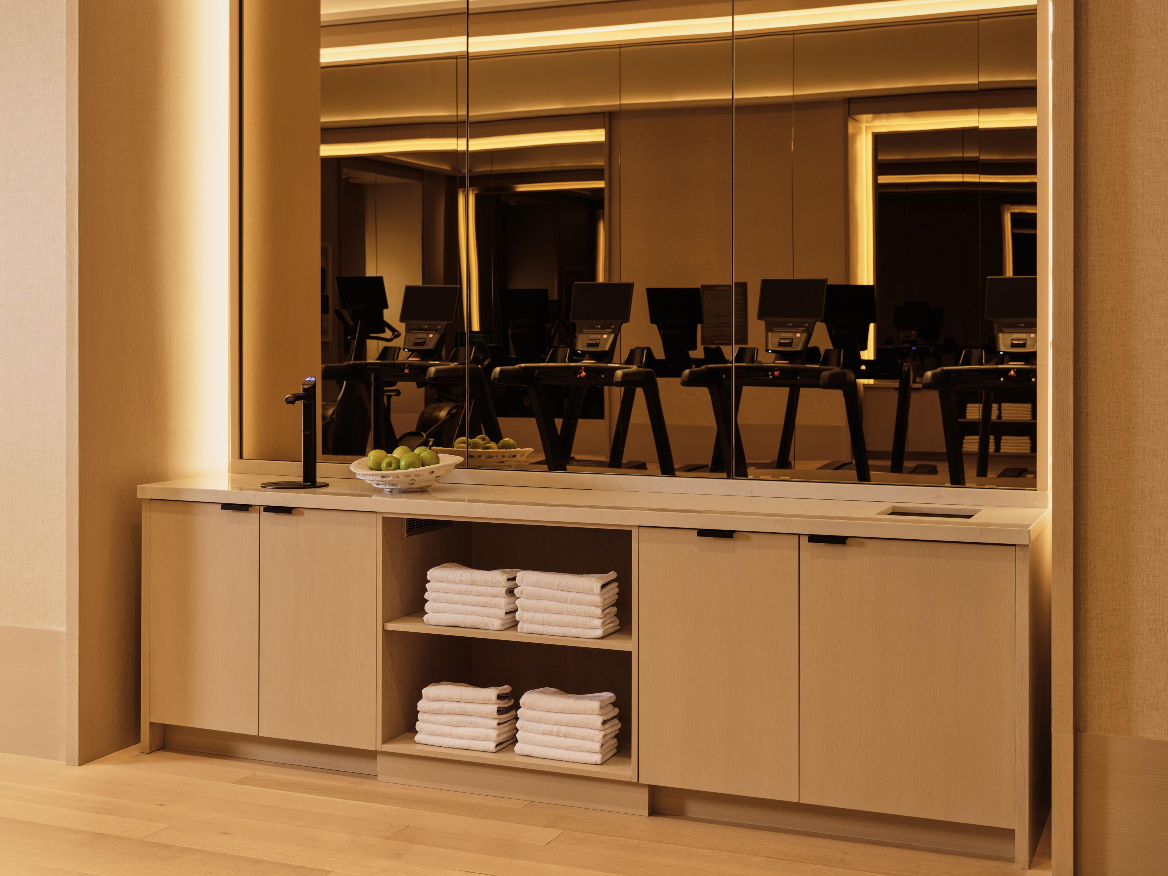 Kimpton Era gym with treadmills and towel station
