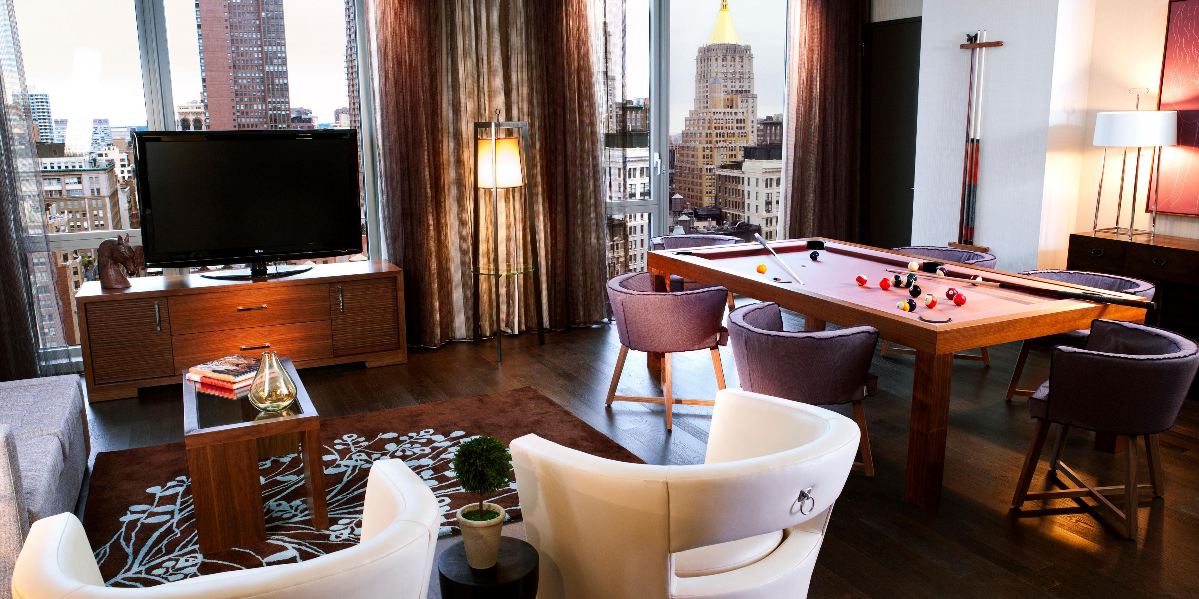 Our residential-style suites oblige you in various ways, some offering a Jacuzzi tub, large private balcony, sleeper sofa, separate parlor, or even a pool table. No matter which lavishly appointed suite you choose, each reveals city views through floor-to-ceiling windows.