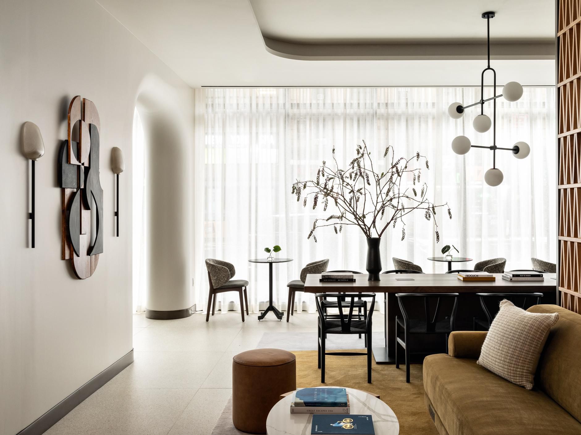 Cozy, stylish lobby lounge area with warm ambiance