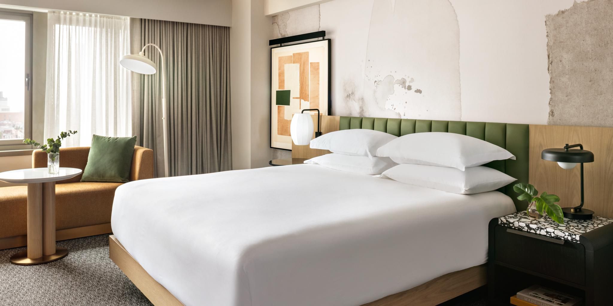 Luxury king bed guest room with plush bedding