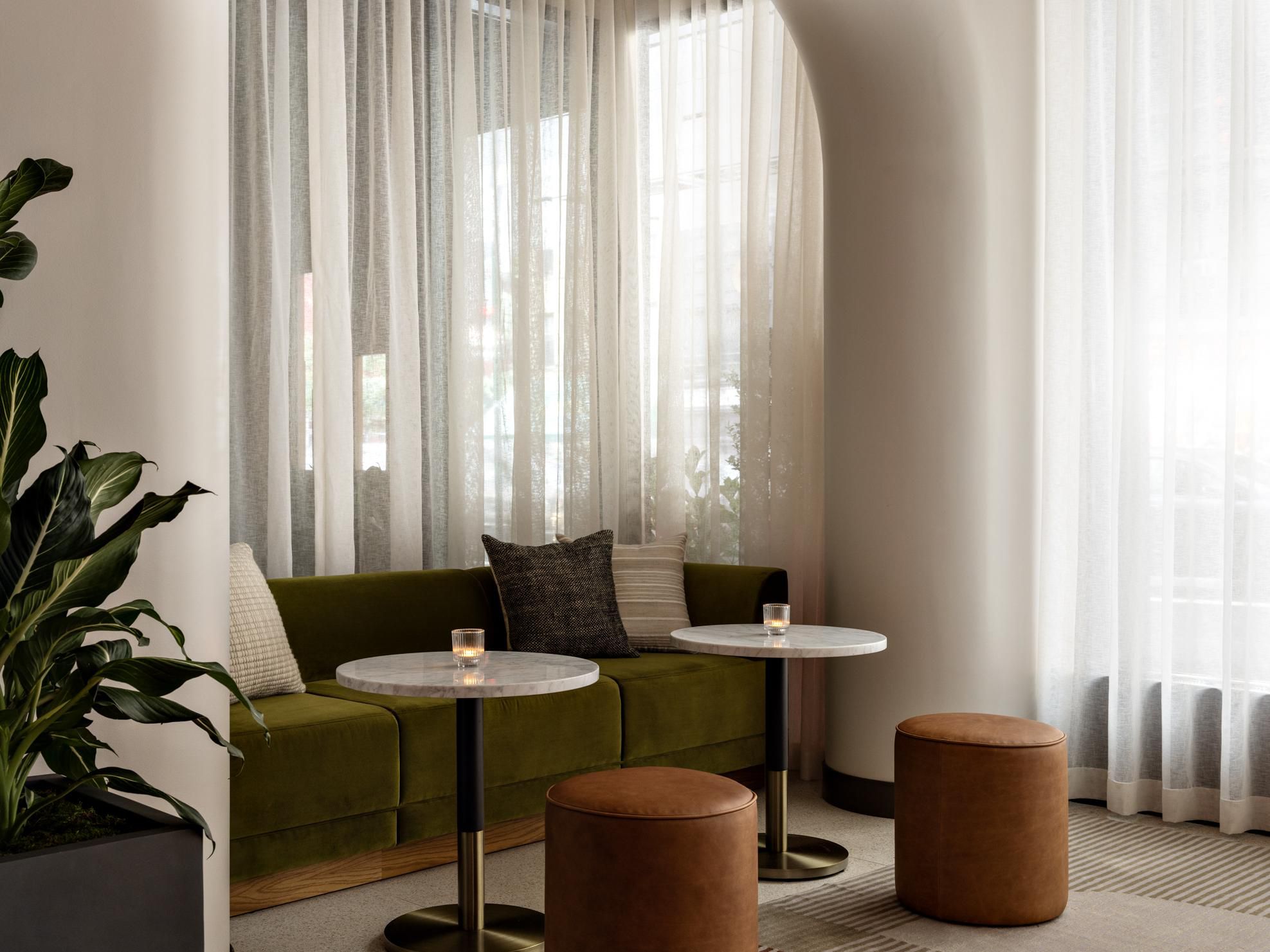 Secluded nook in lounge with plush seating & ambient lighting