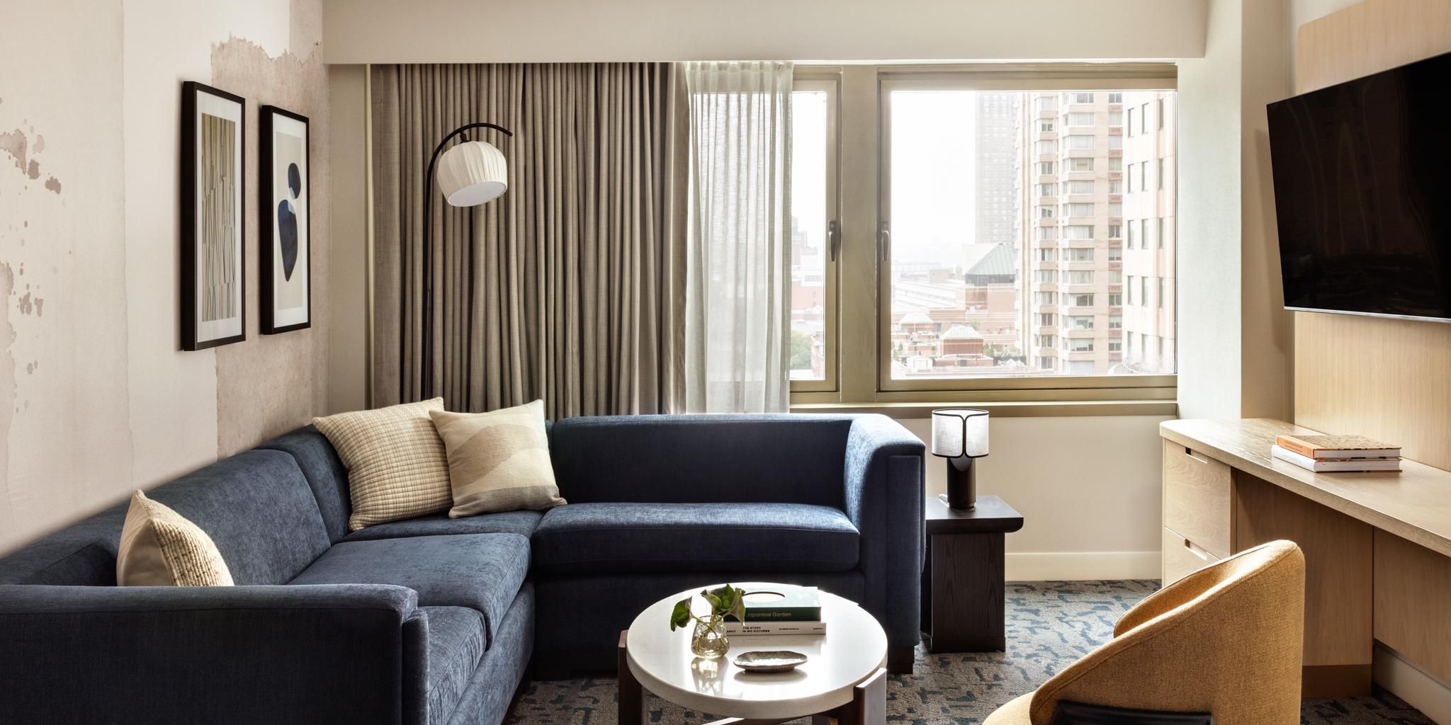 Modern suite featuring a comfortable living area