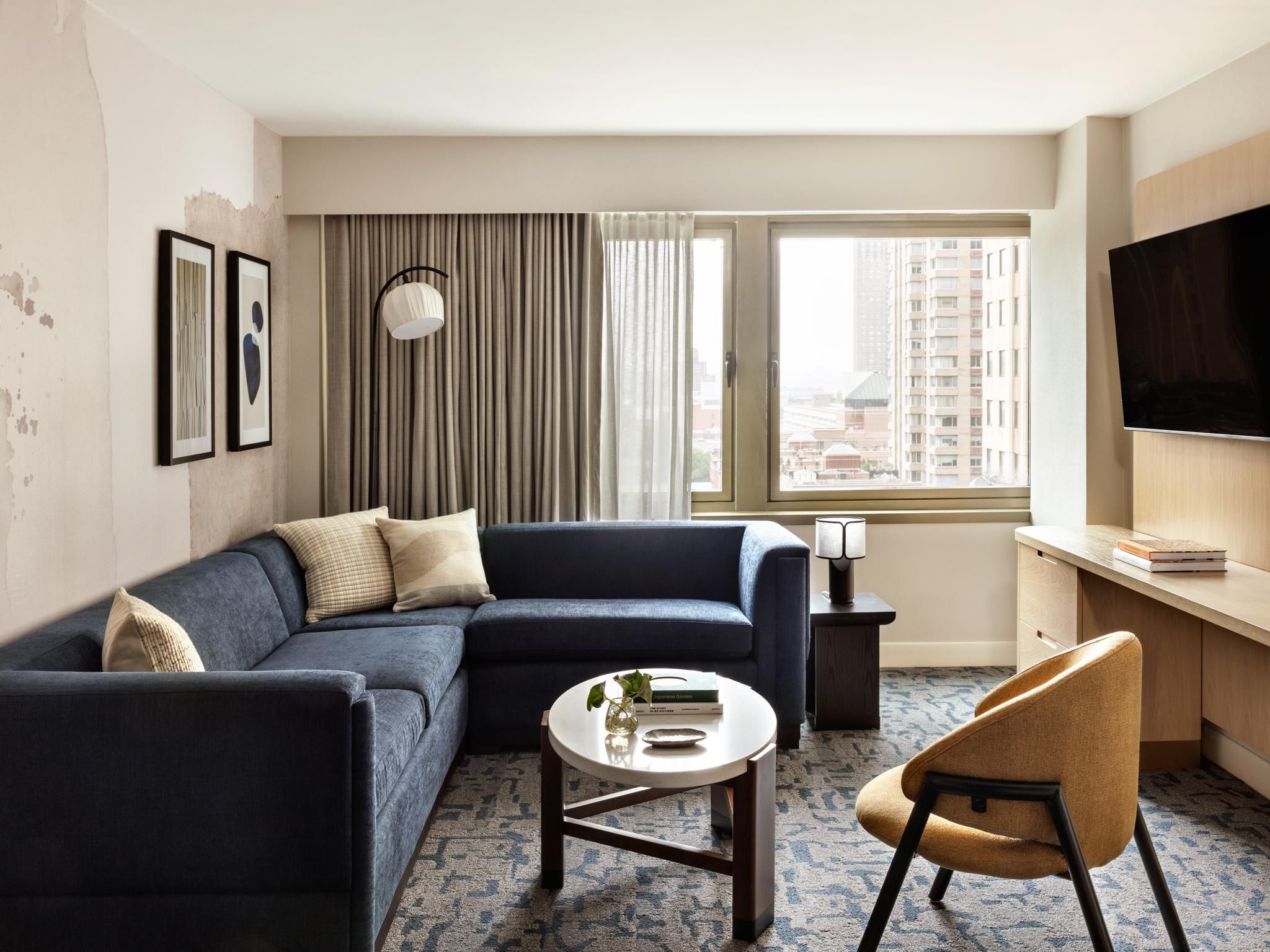 Modern suite featuring a comfortable living area
