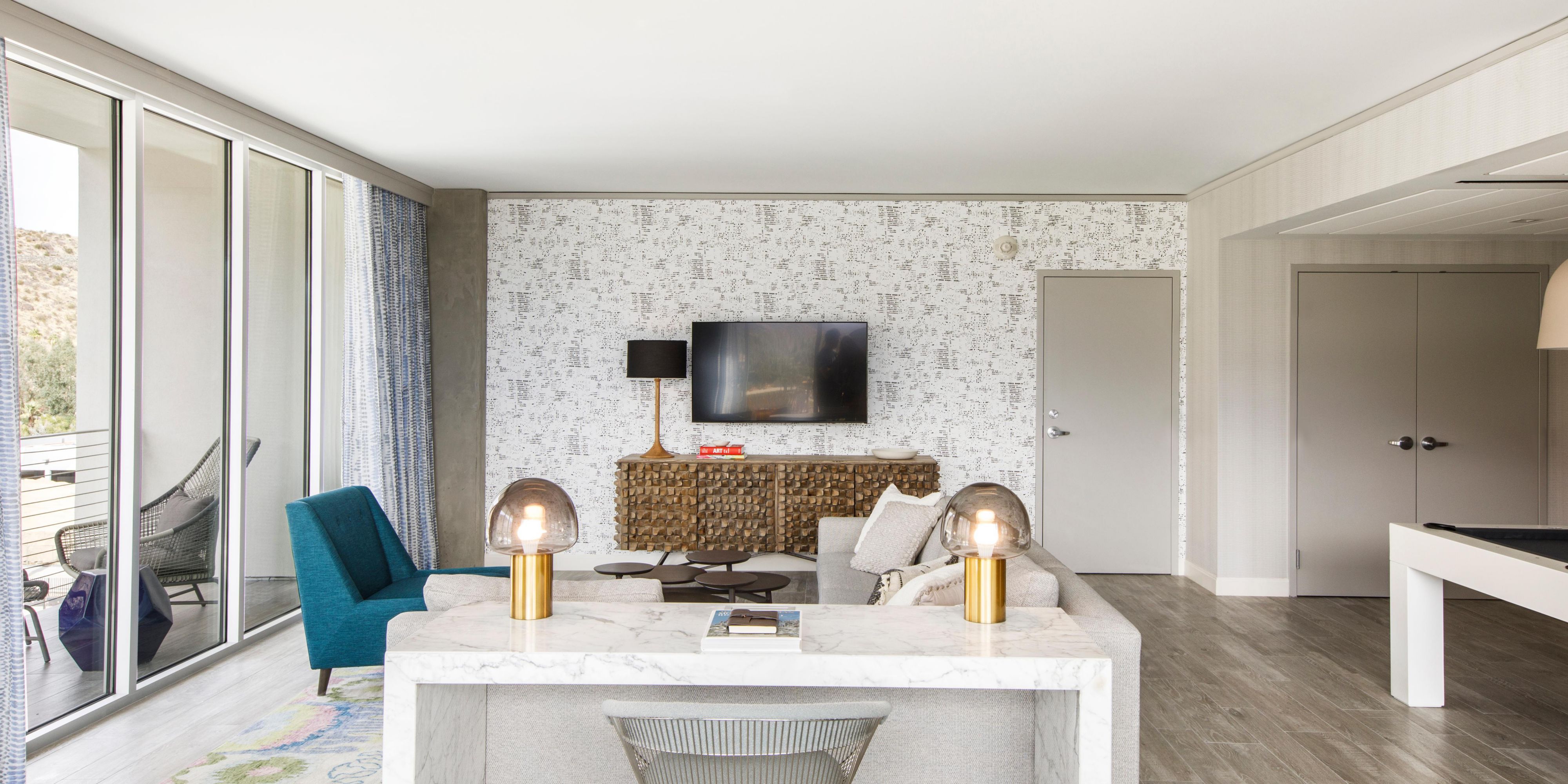 Living area with pull out sofa and pool table