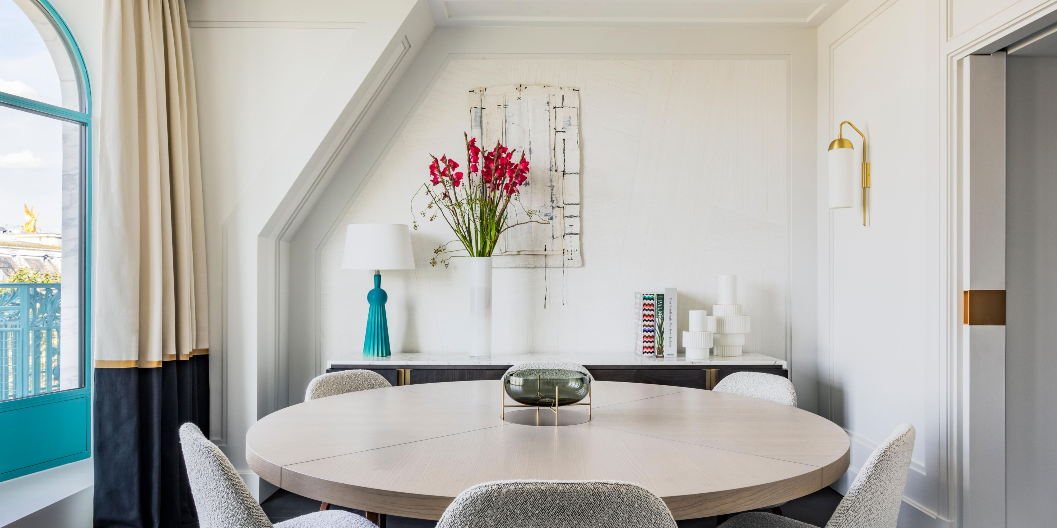 Enjoy the Suite Honoré's dining room overlooking the Opéra Garnier