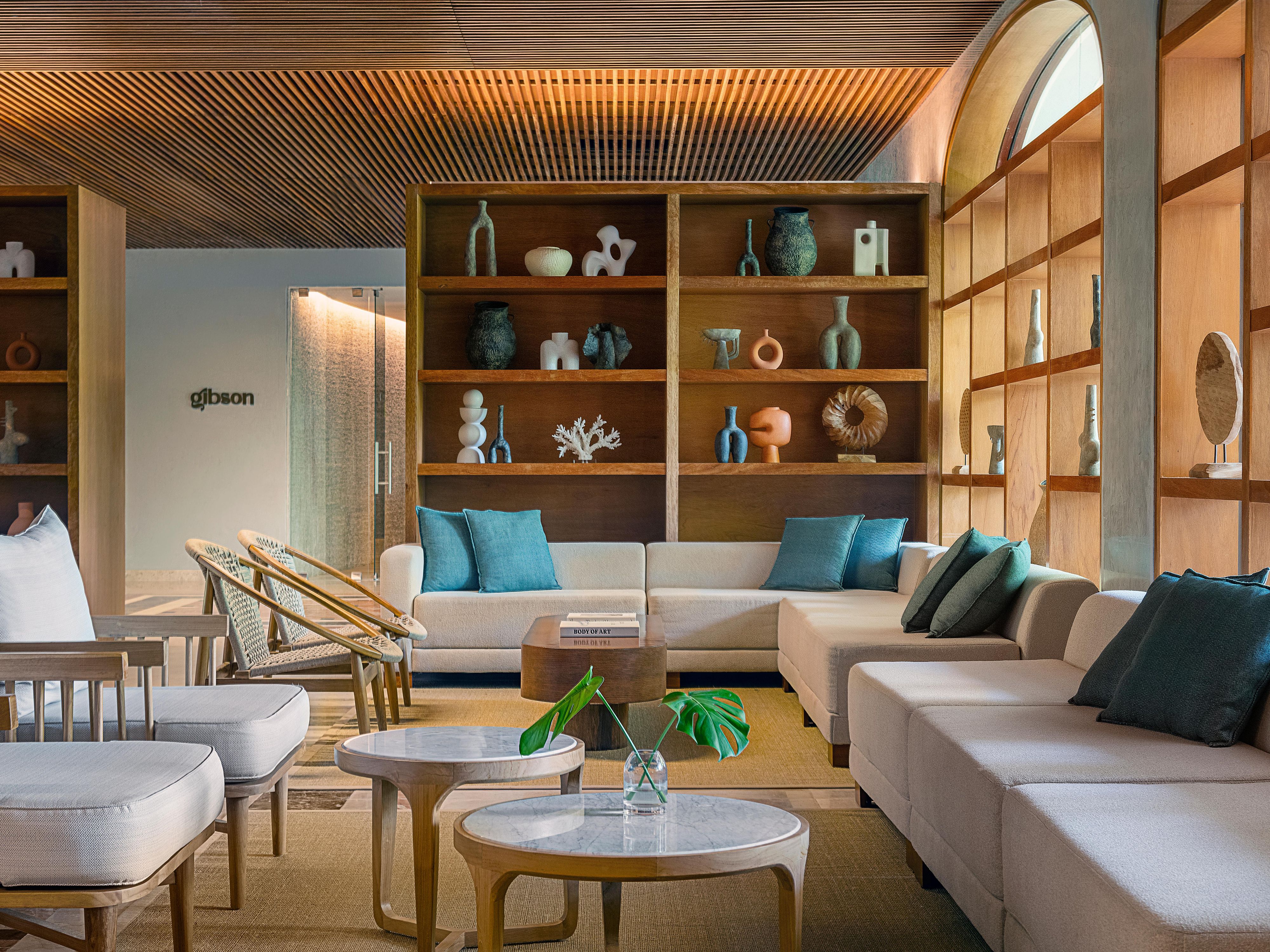 Contemporary hotel lobby lounge with seating and décor
