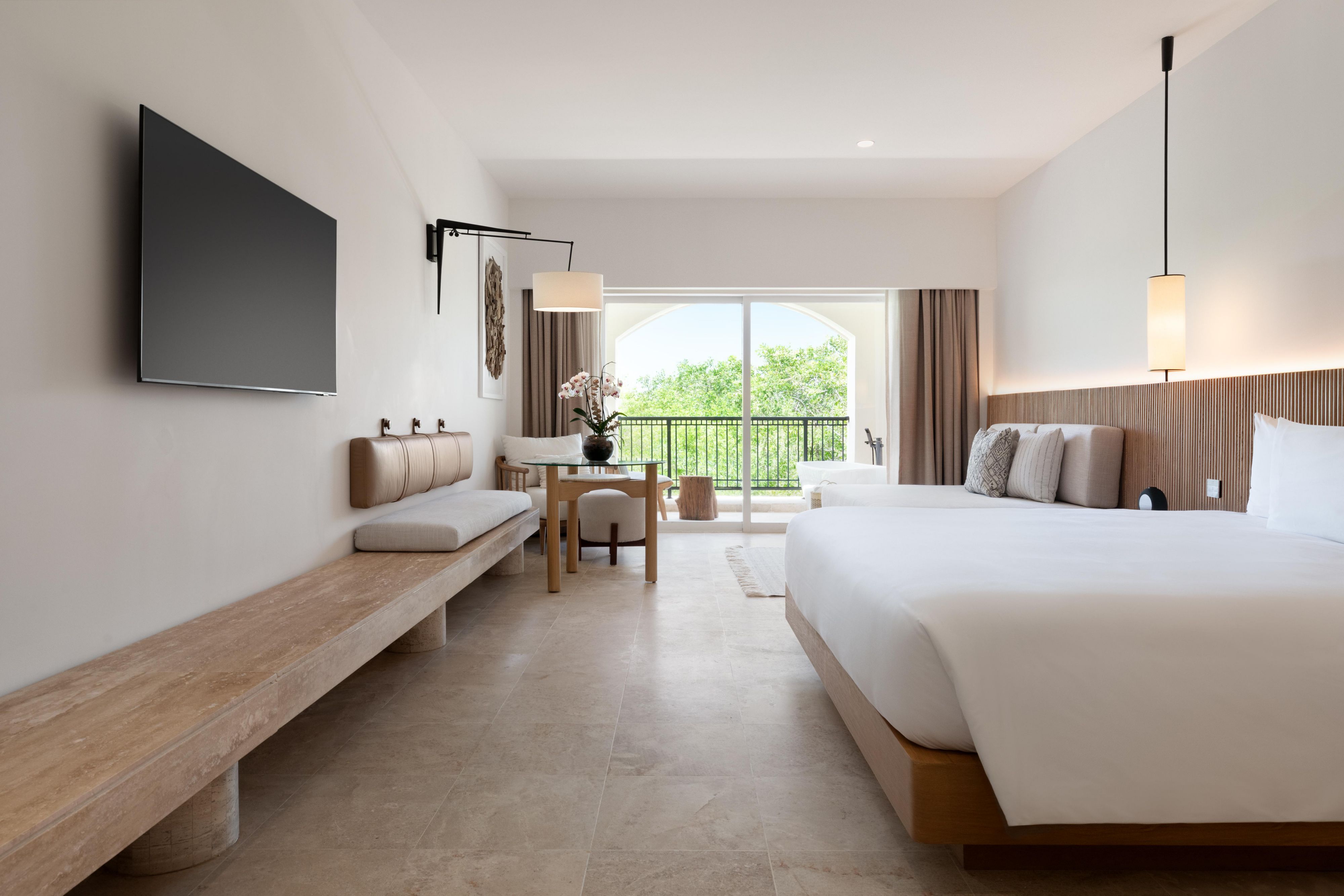 Kimpton Tres Rios - All Inclusive guest room featuring king bed and balcony