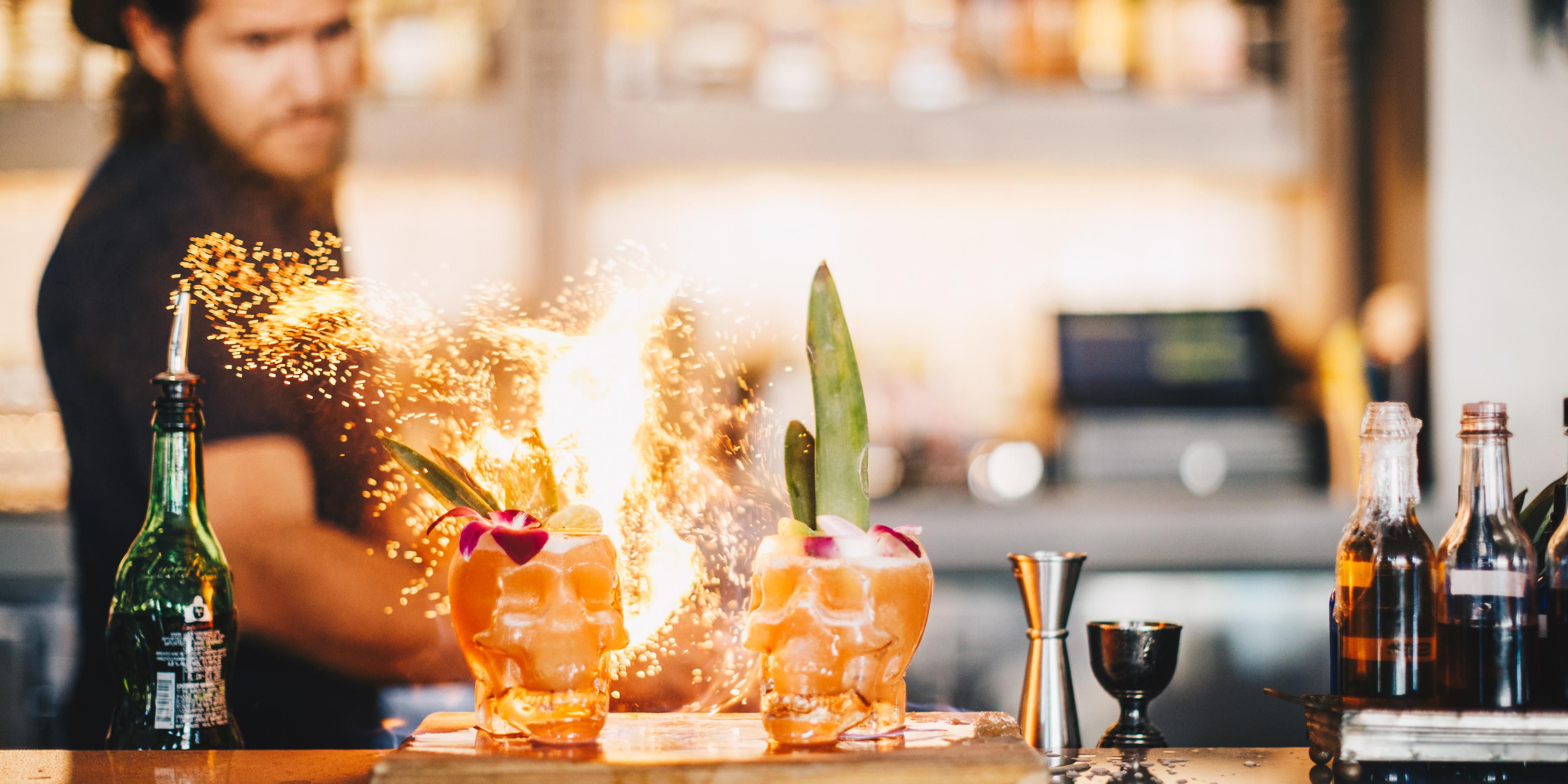 Our beautiful beachfront restaurant pairs tiki-inspired cocktails
