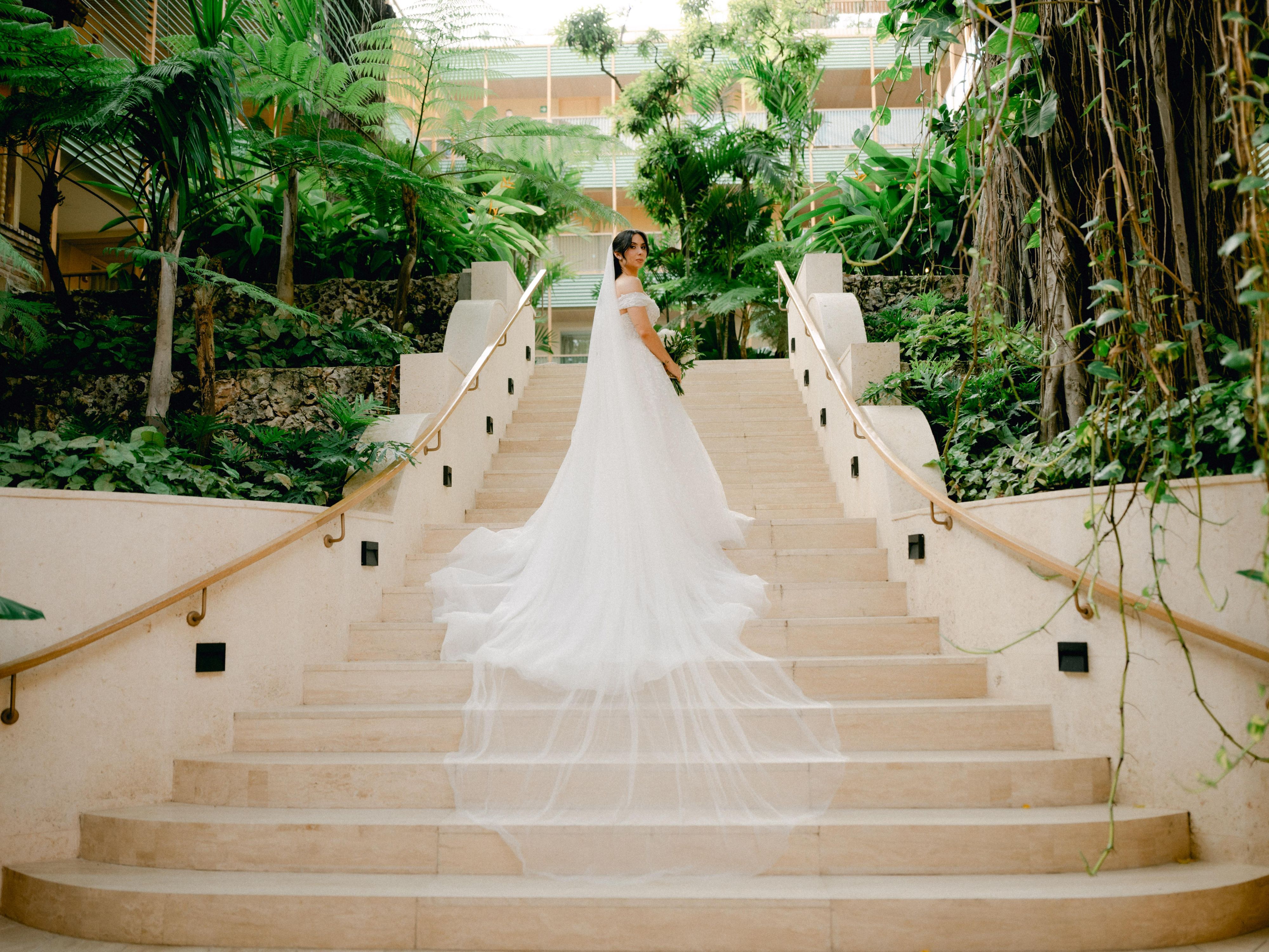 Bride posing on a staircase