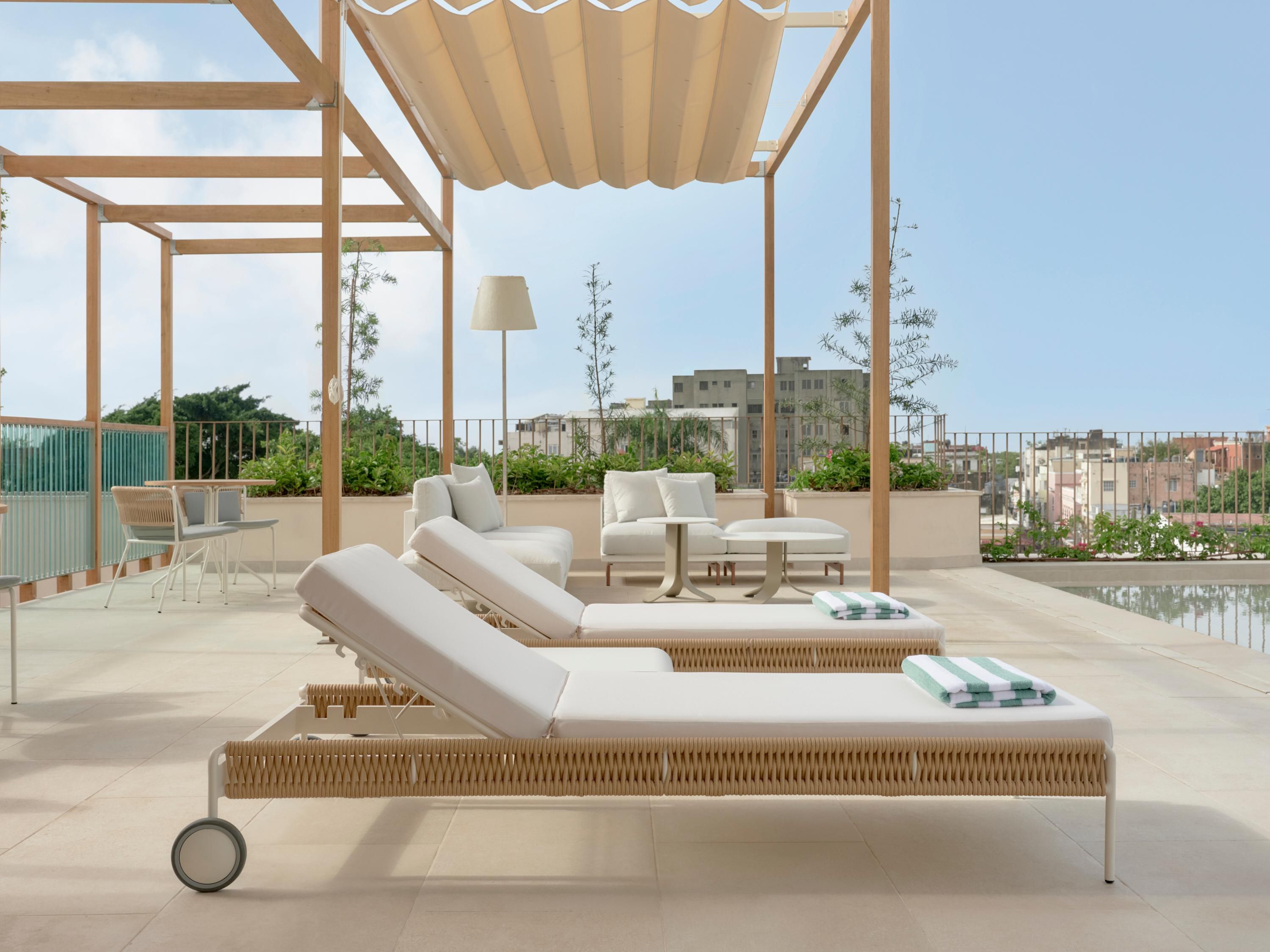 Deck chairs next to the pool