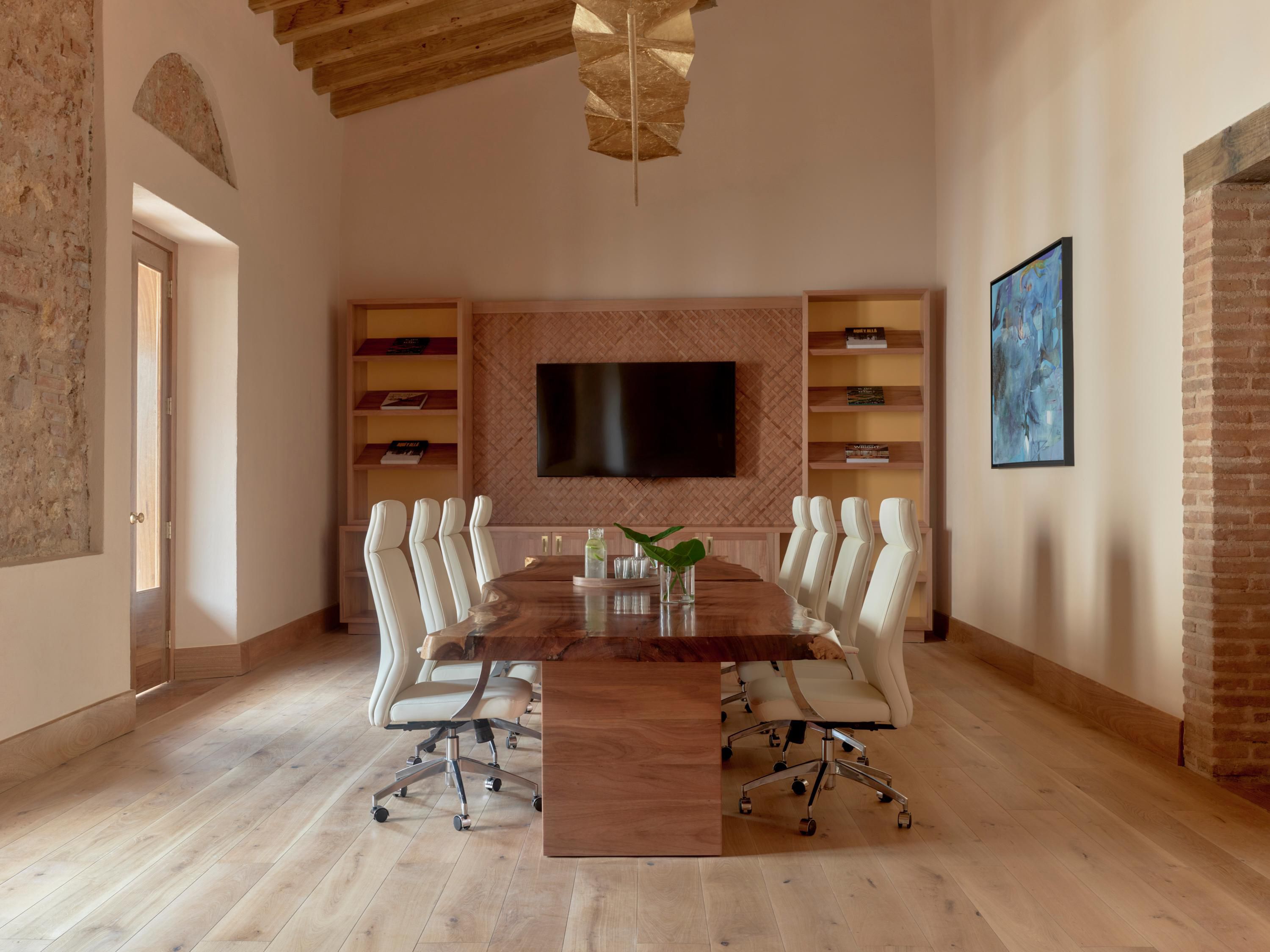 Duarte meeting room with plenty of natural lighting and a television