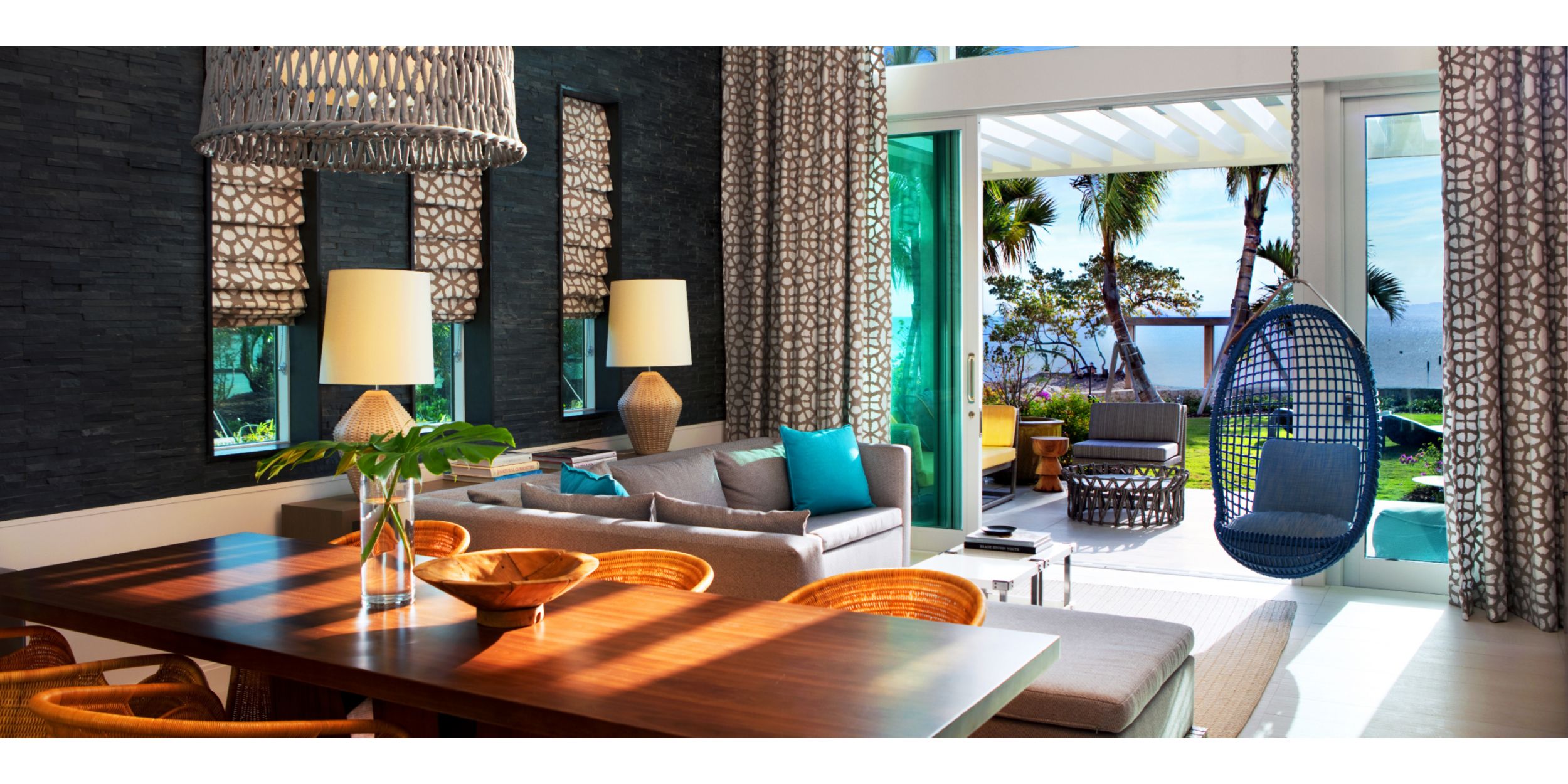 bungalow in grand cayman with colorful decor and stuning views of the ocean