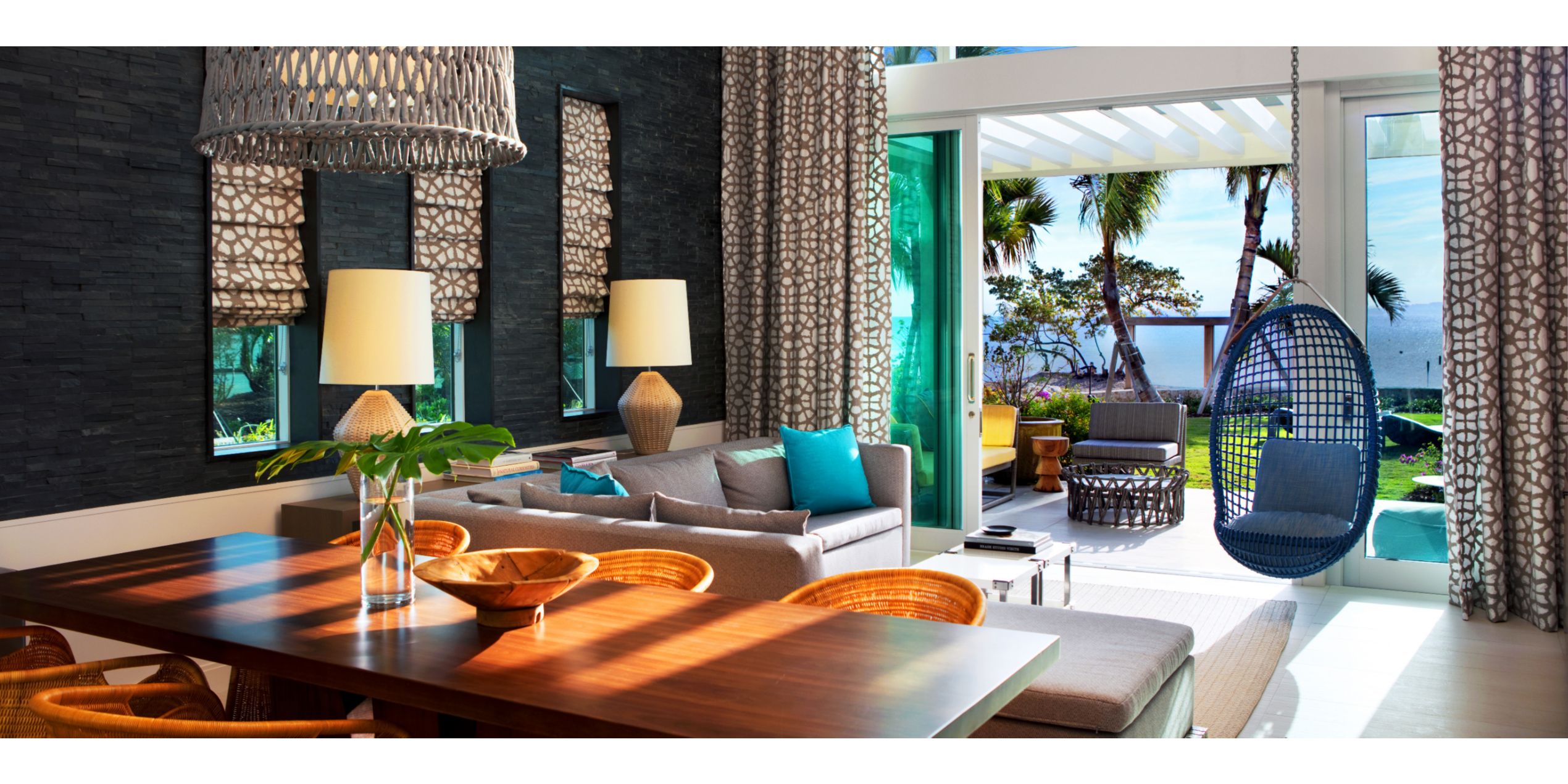 bungalow in grand cayman with colorful decor and stuning views of the ocean
