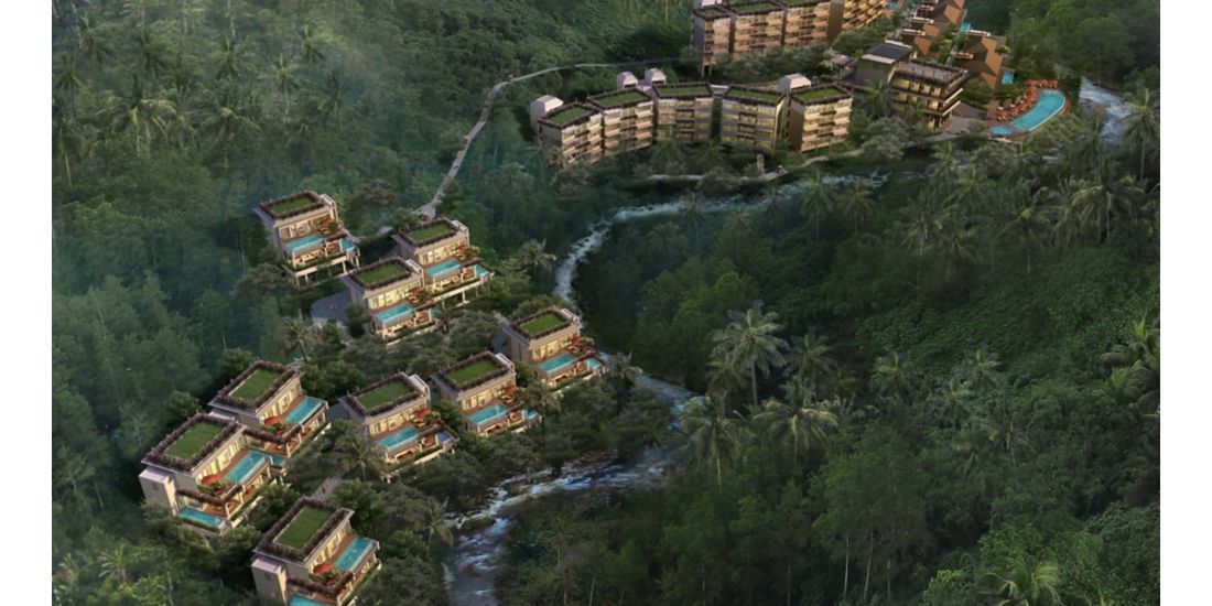 lush hillside setting with aerial view of hotel and pools
