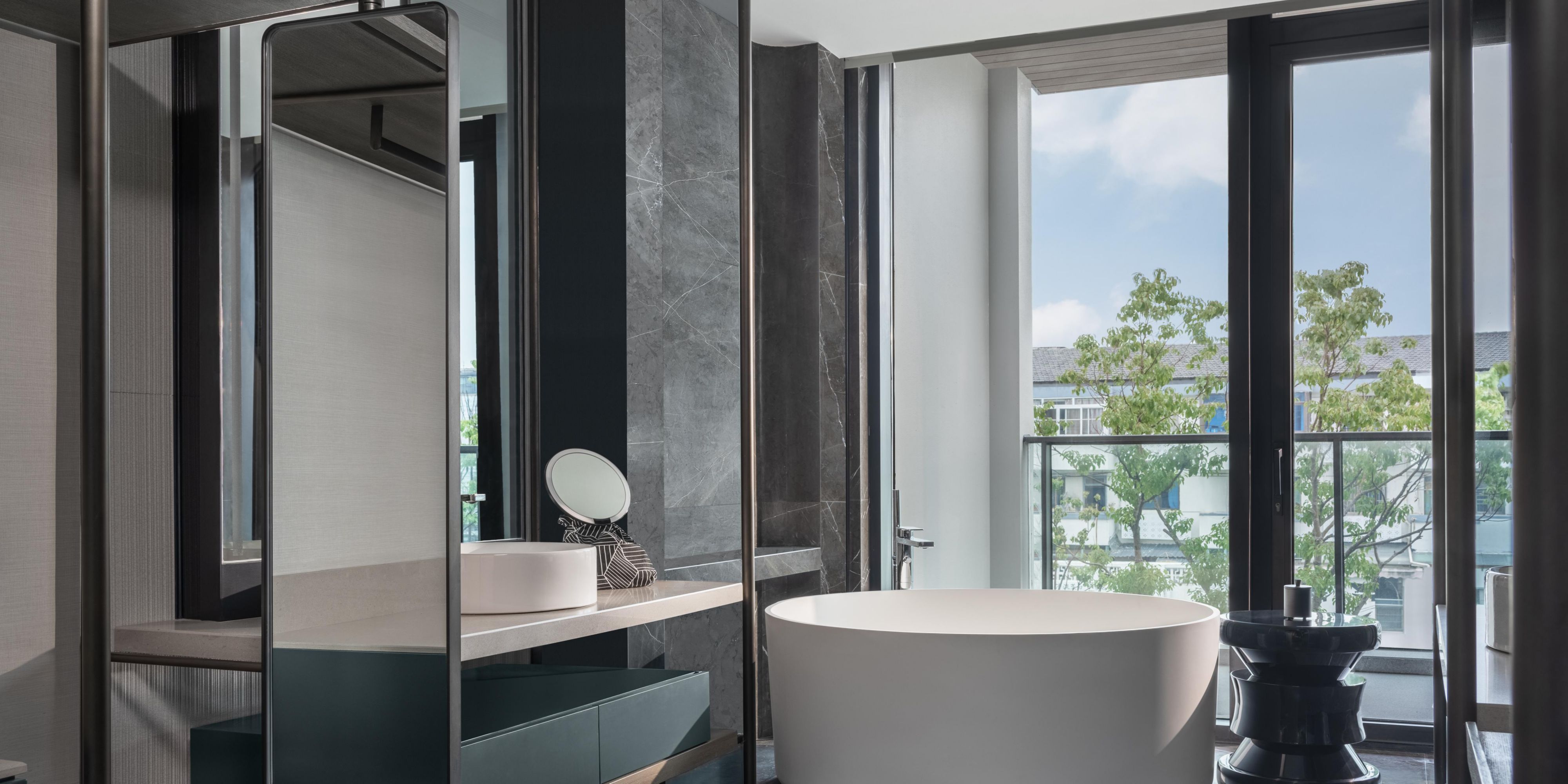 Enjoy the stunning view from the floor-to-ceiling panoramic window