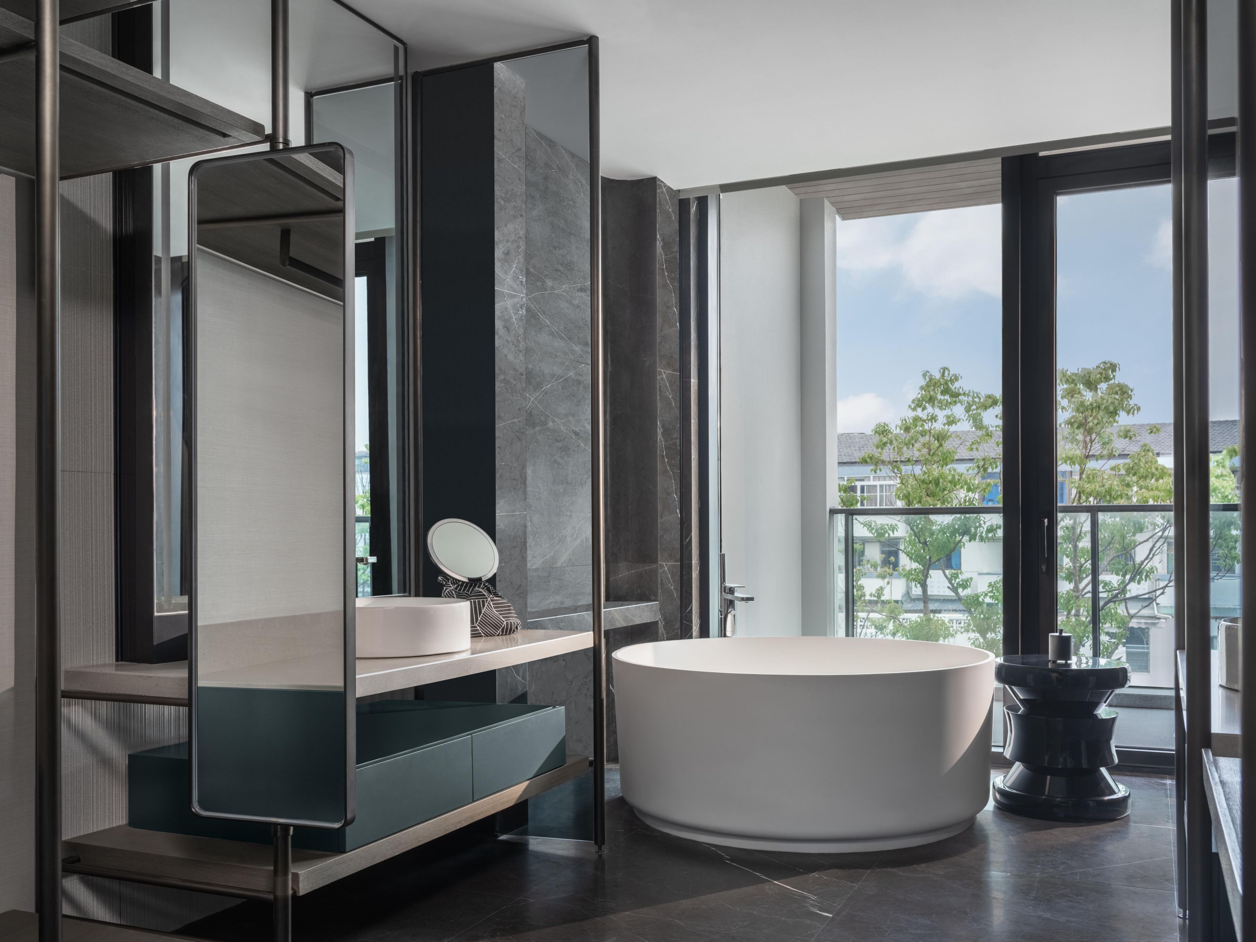 Enjoy the stunning view from the floor-to-ceiling panoramic window