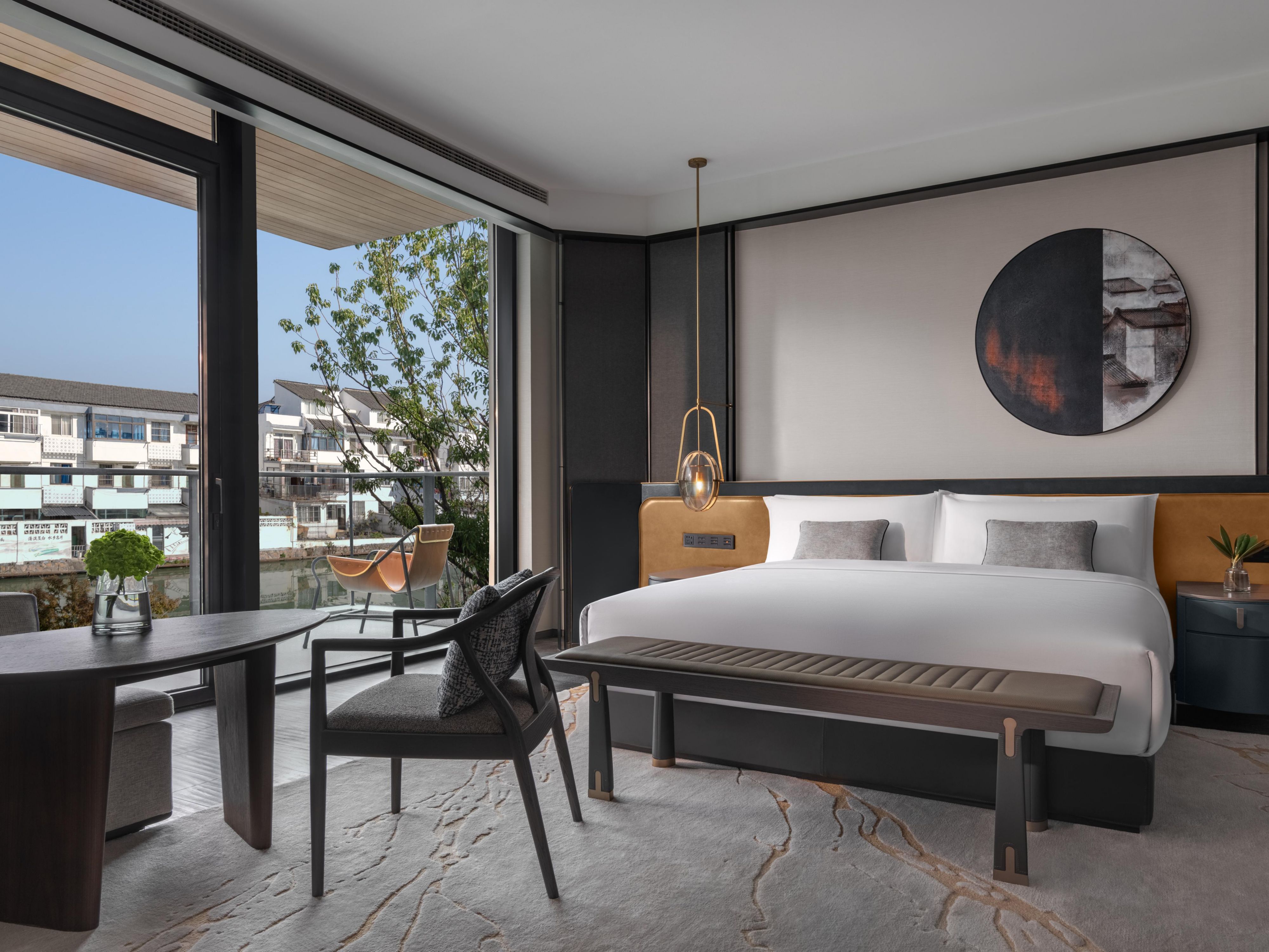Feel the nature and enjoy the Suzhou canal view from the room