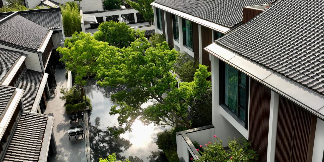 Reflecting pool and garden at Kimpton Bamboo Grove Suzhou