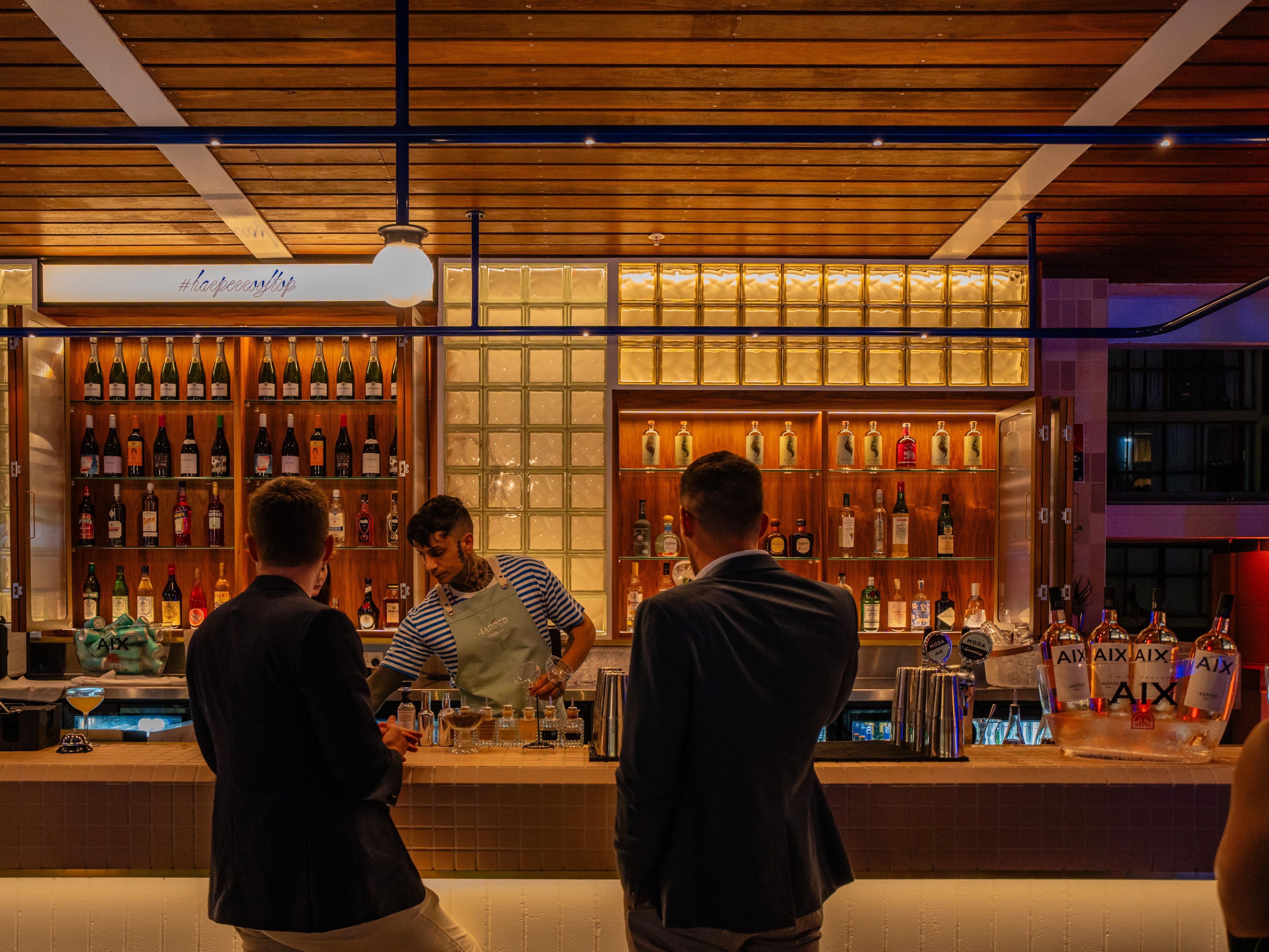 Enjoy intimate after-work drinks at Harper Rooftop Bar