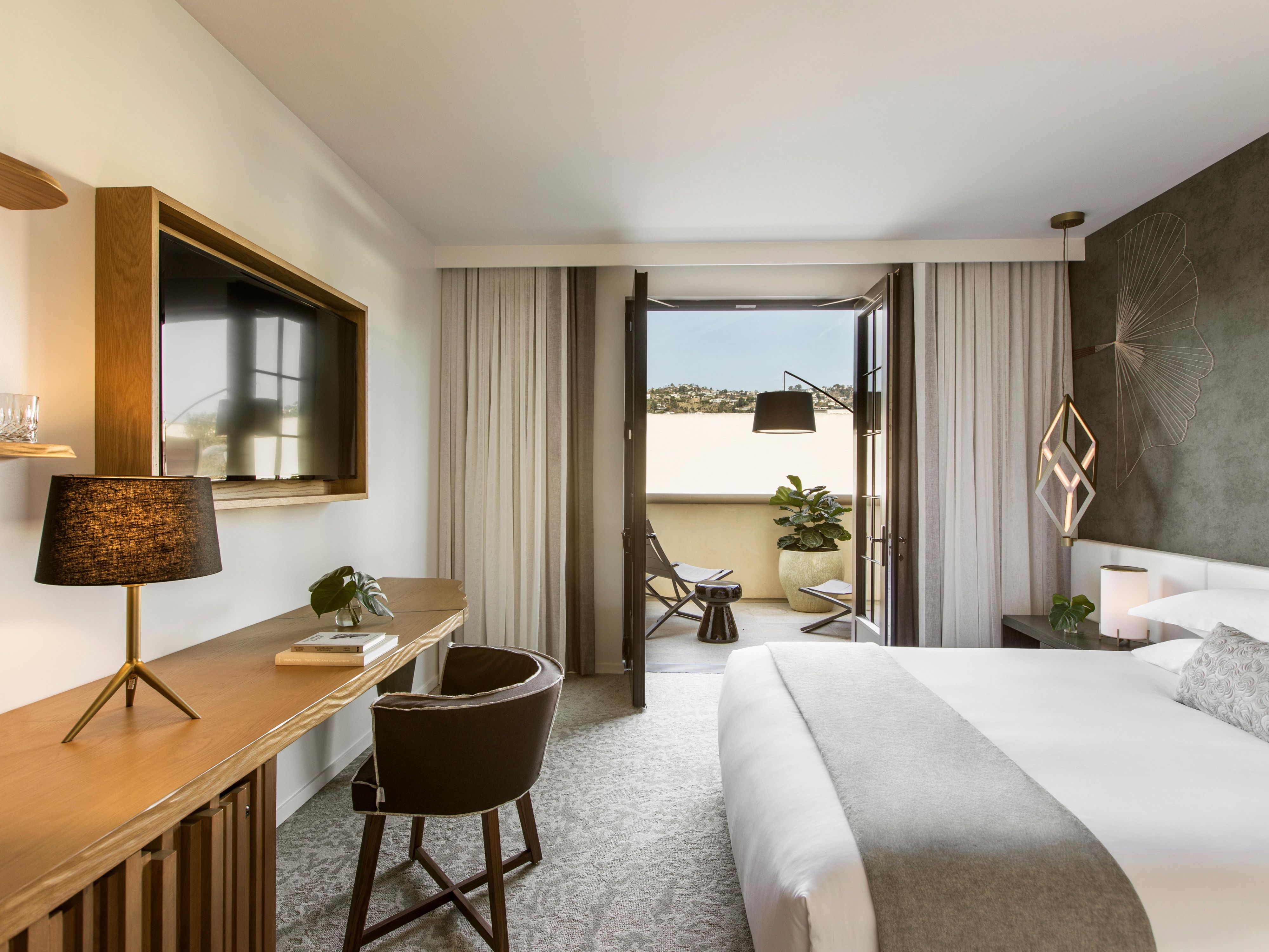 Room features a 125 sqft private outdoor furnished terrace