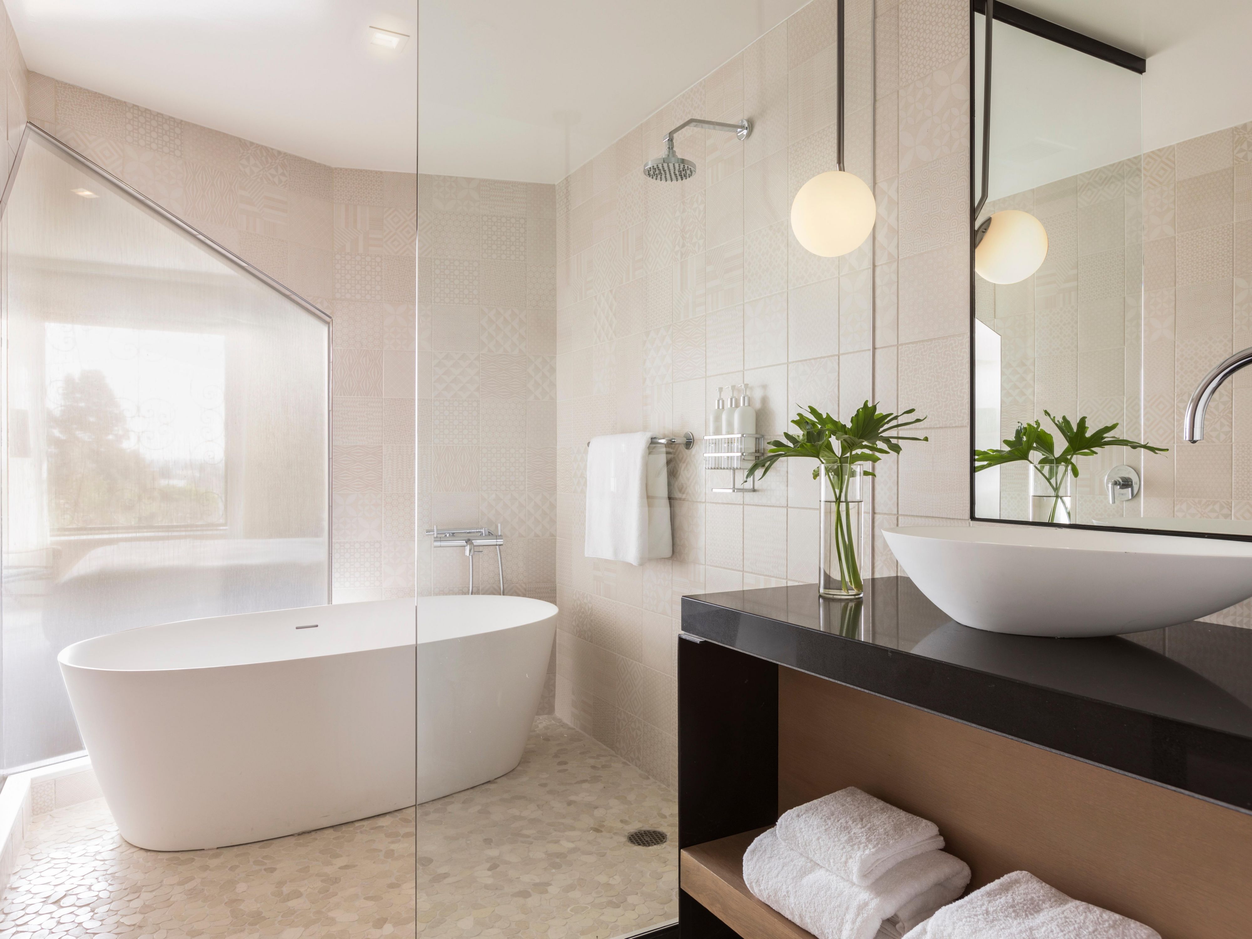 Rain shower and separate deep soaking tub