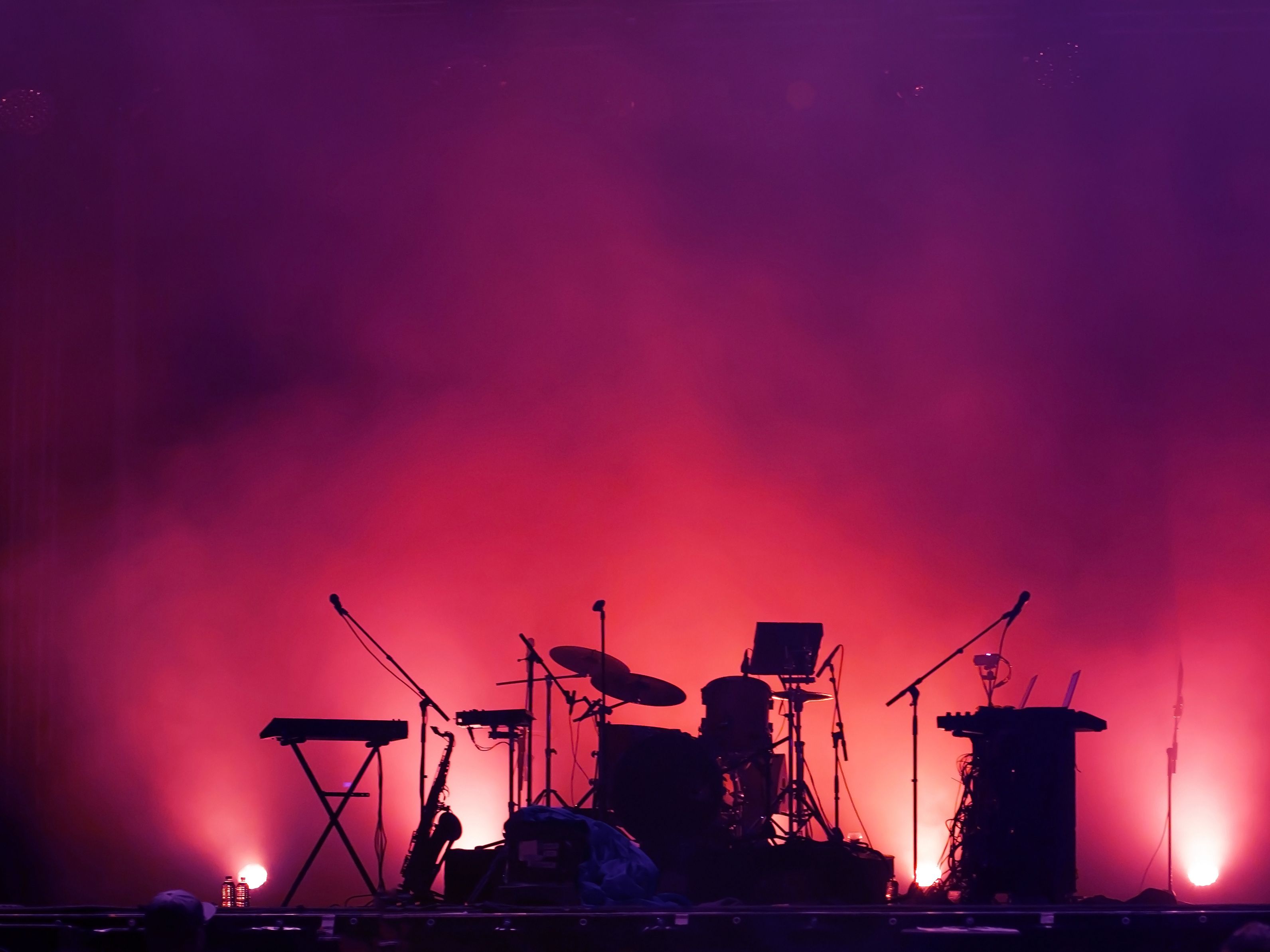 band equipment on stage at sunset