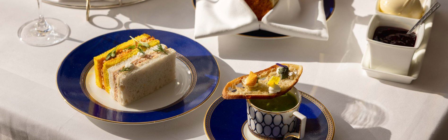 afternoon tea with sandwiches, tea and delights