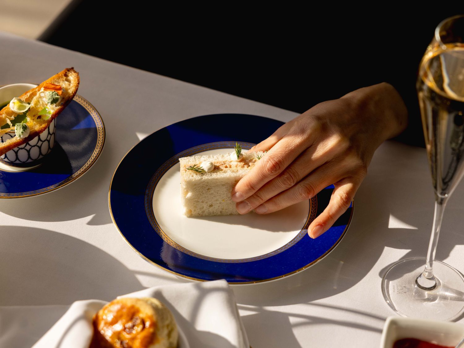 afternoon tea with champgne and sandwiches